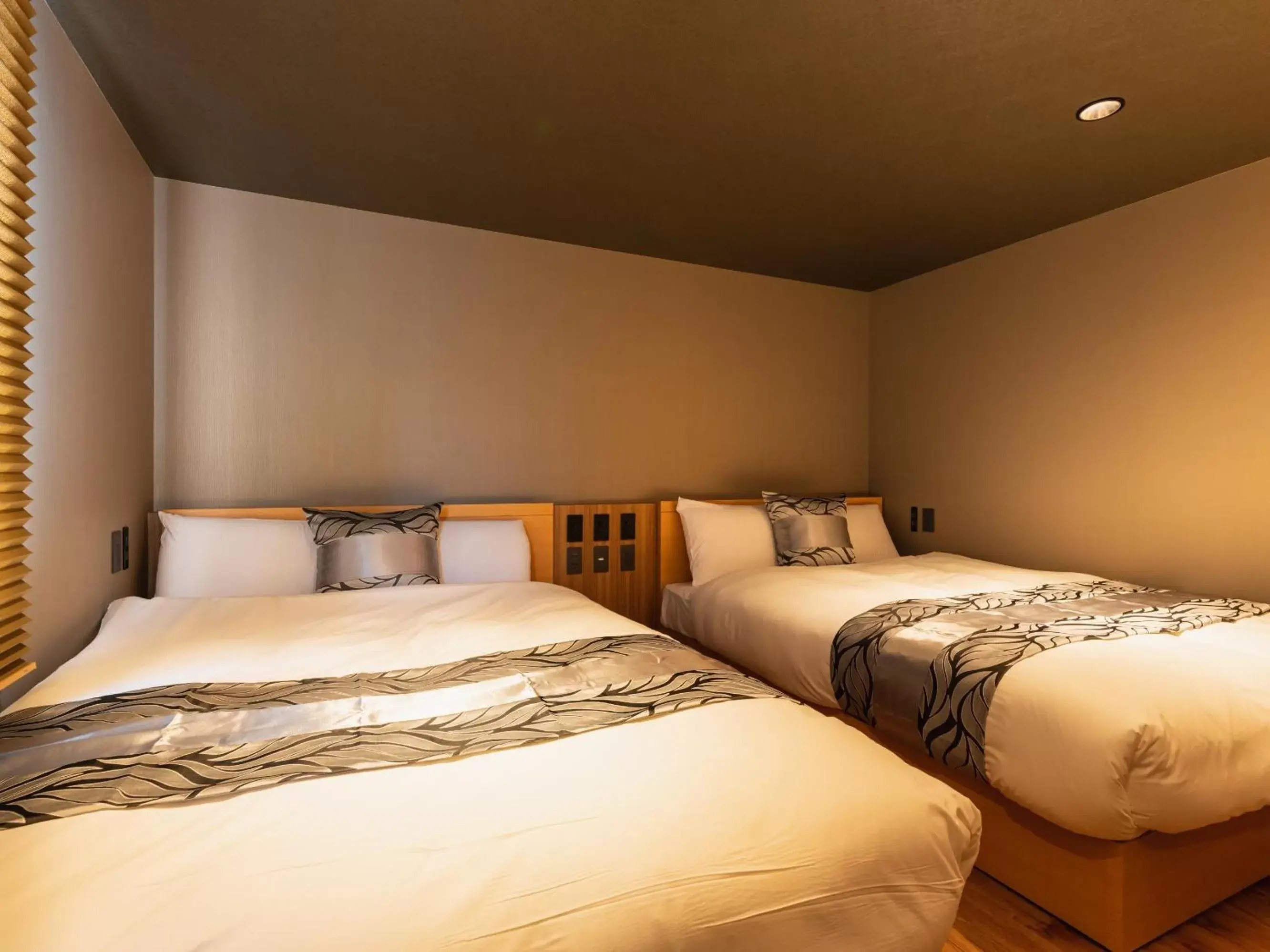 Bedroom, Bed in GRAND BASE Beppu Ekimae
