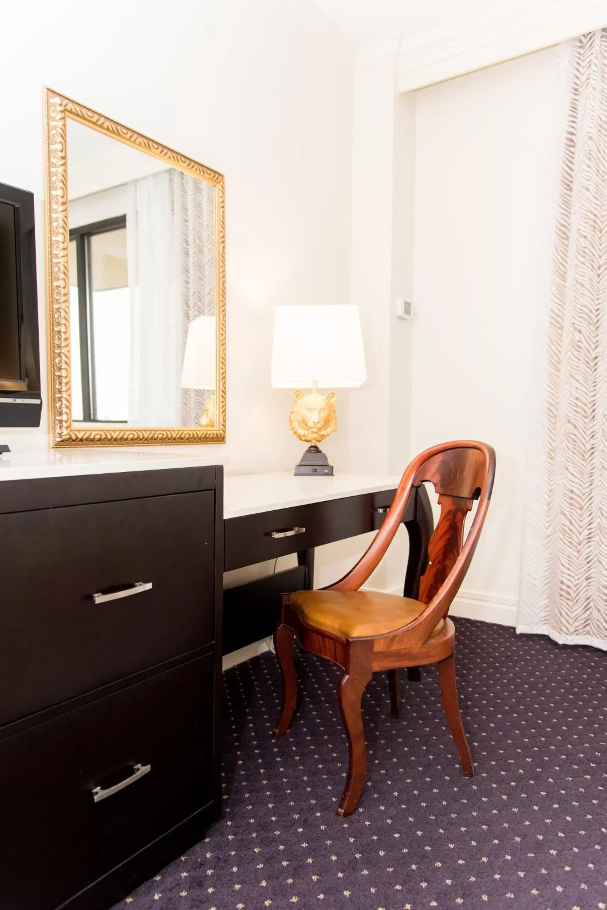 Seating area, TV/Entertainment Center in The Cook Hotel & Conference Center