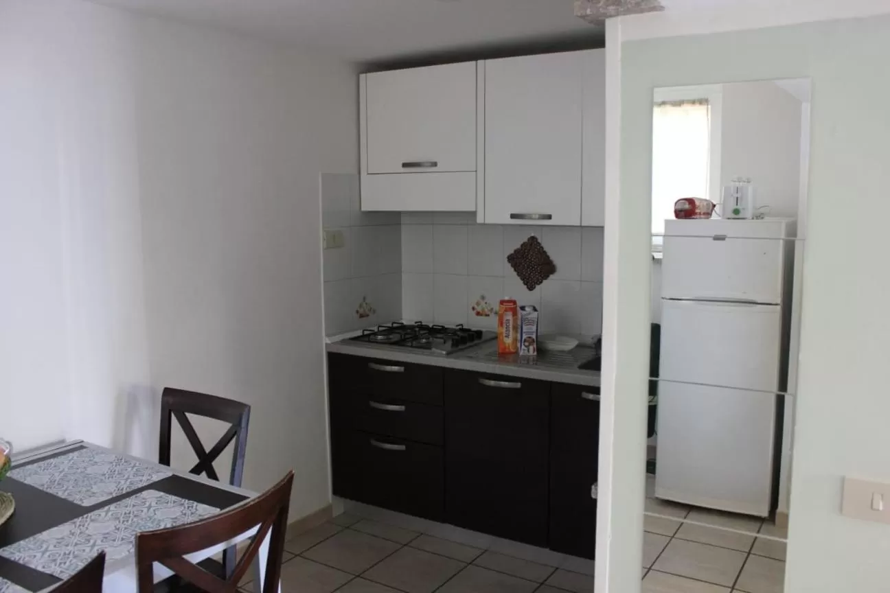 Kitchen/Kitchenette in Relais Maria Luisa Locazione turistica di Simona Capaccio