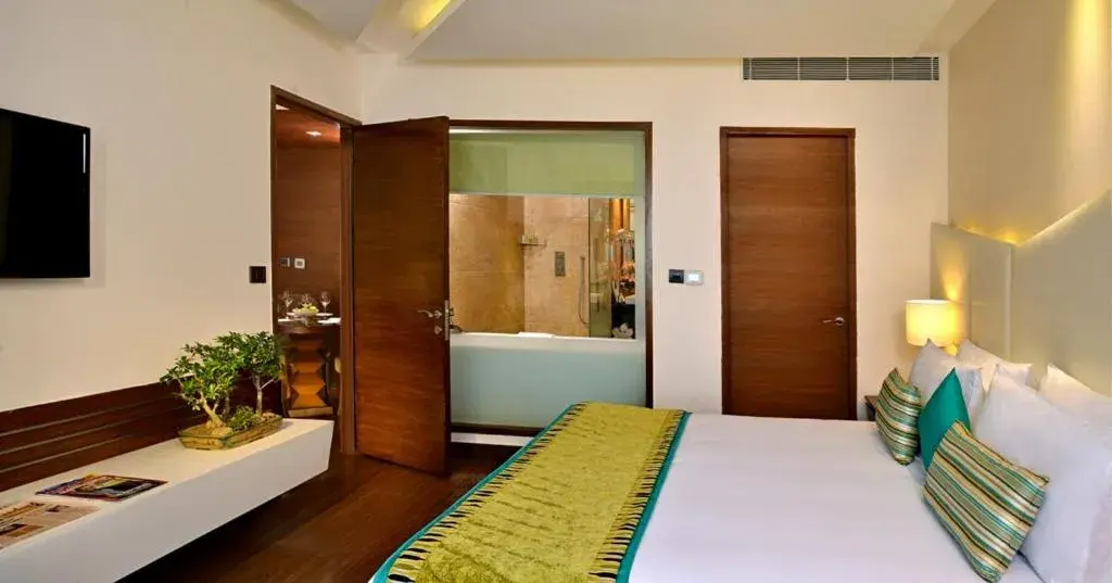 Bed in Golden Tulip Lucknow