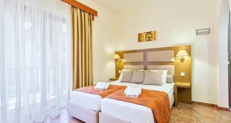 Bedroom, Bed in Rigas Hotel Skopelos