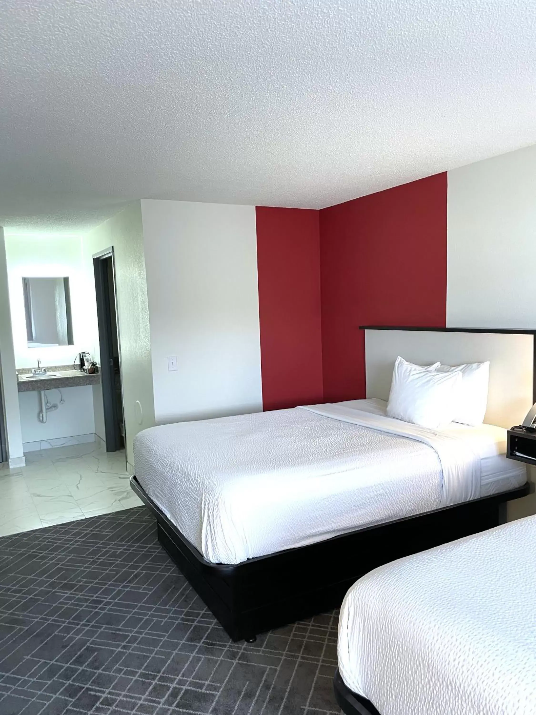 Bed in Ramada by Wyndham Waupaca