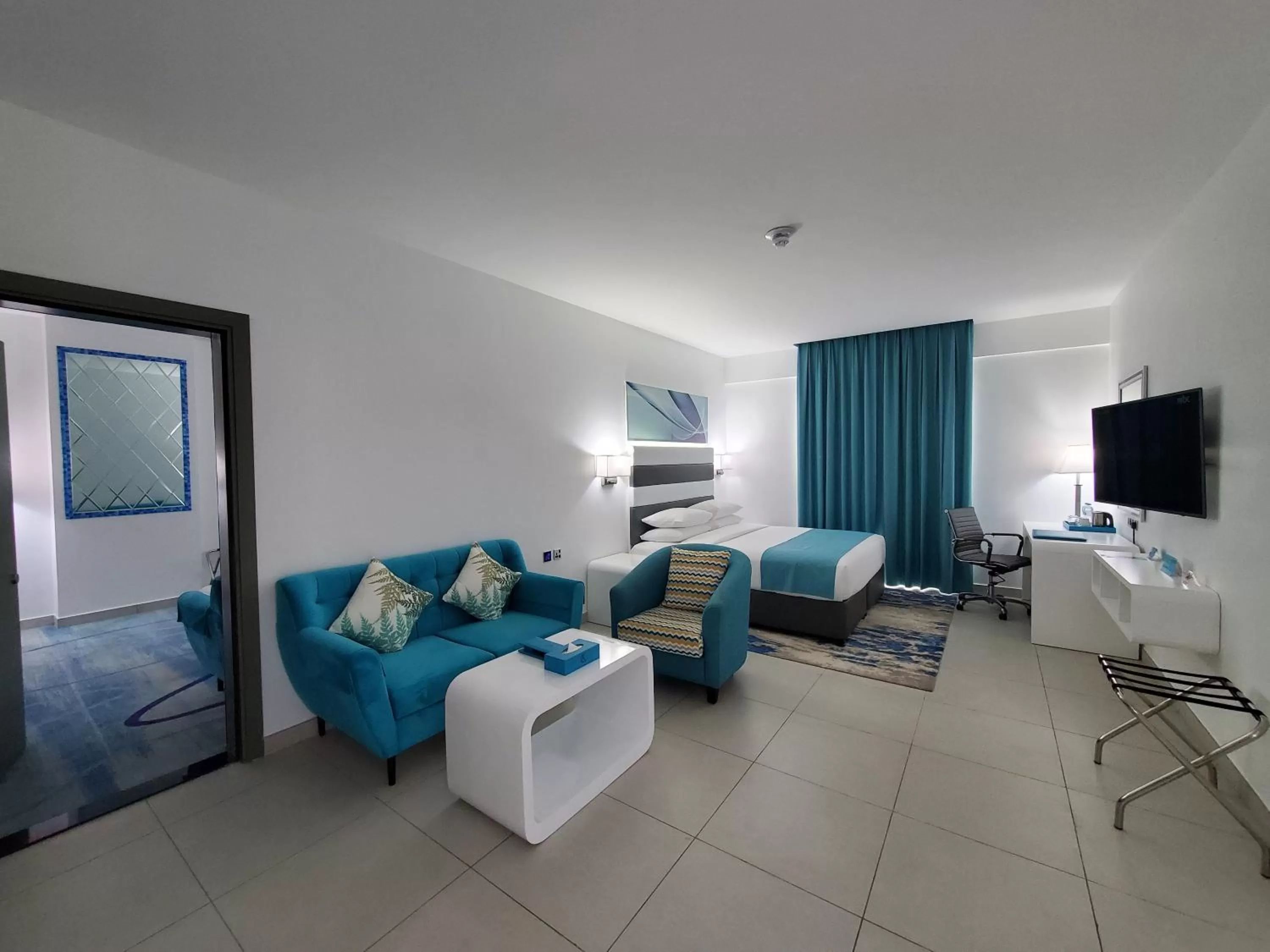 Bedroom in City Avenue Al Reqqa Hotel