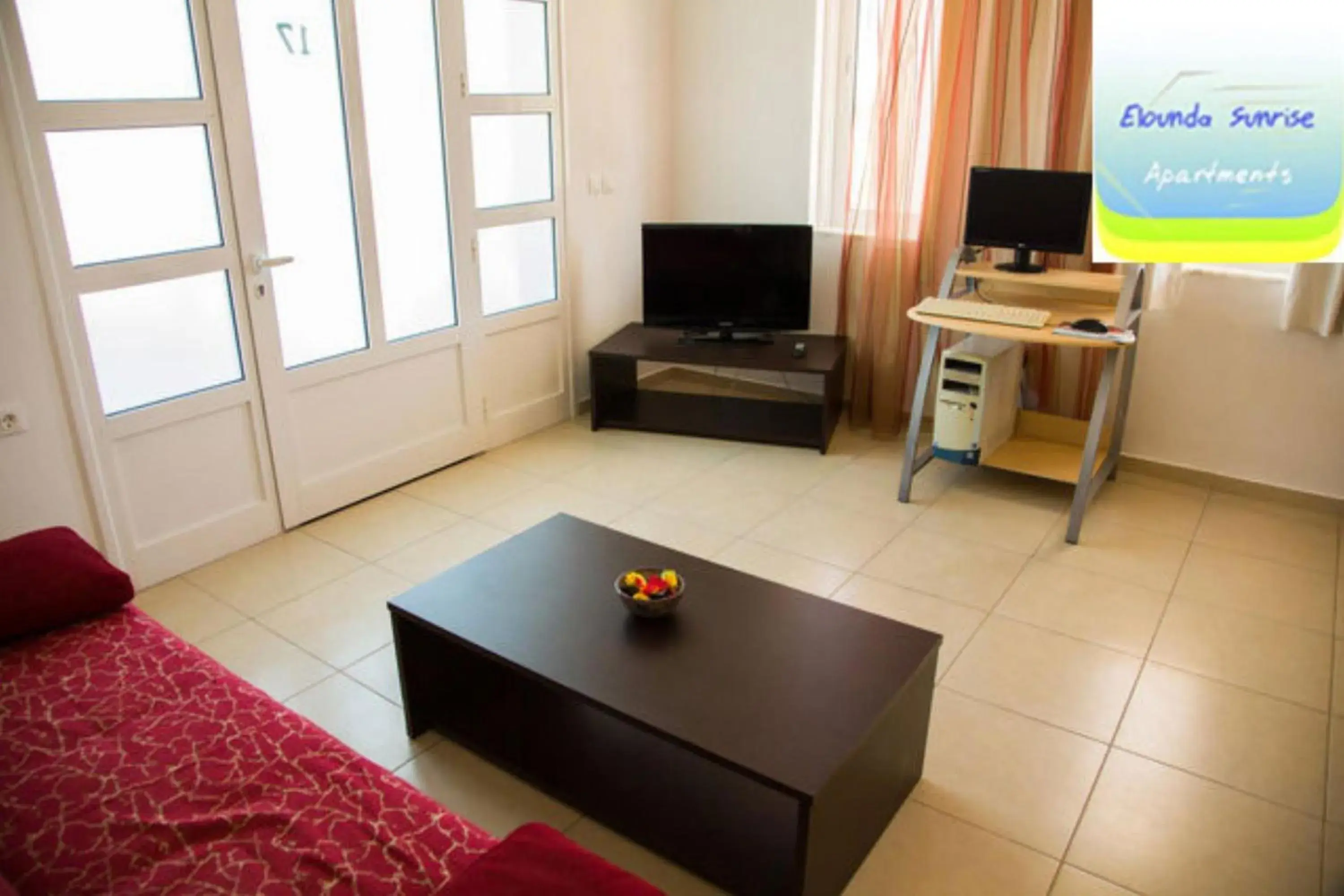 Living room, TV/Entertainment Center in Elounda Sunrise Apartments