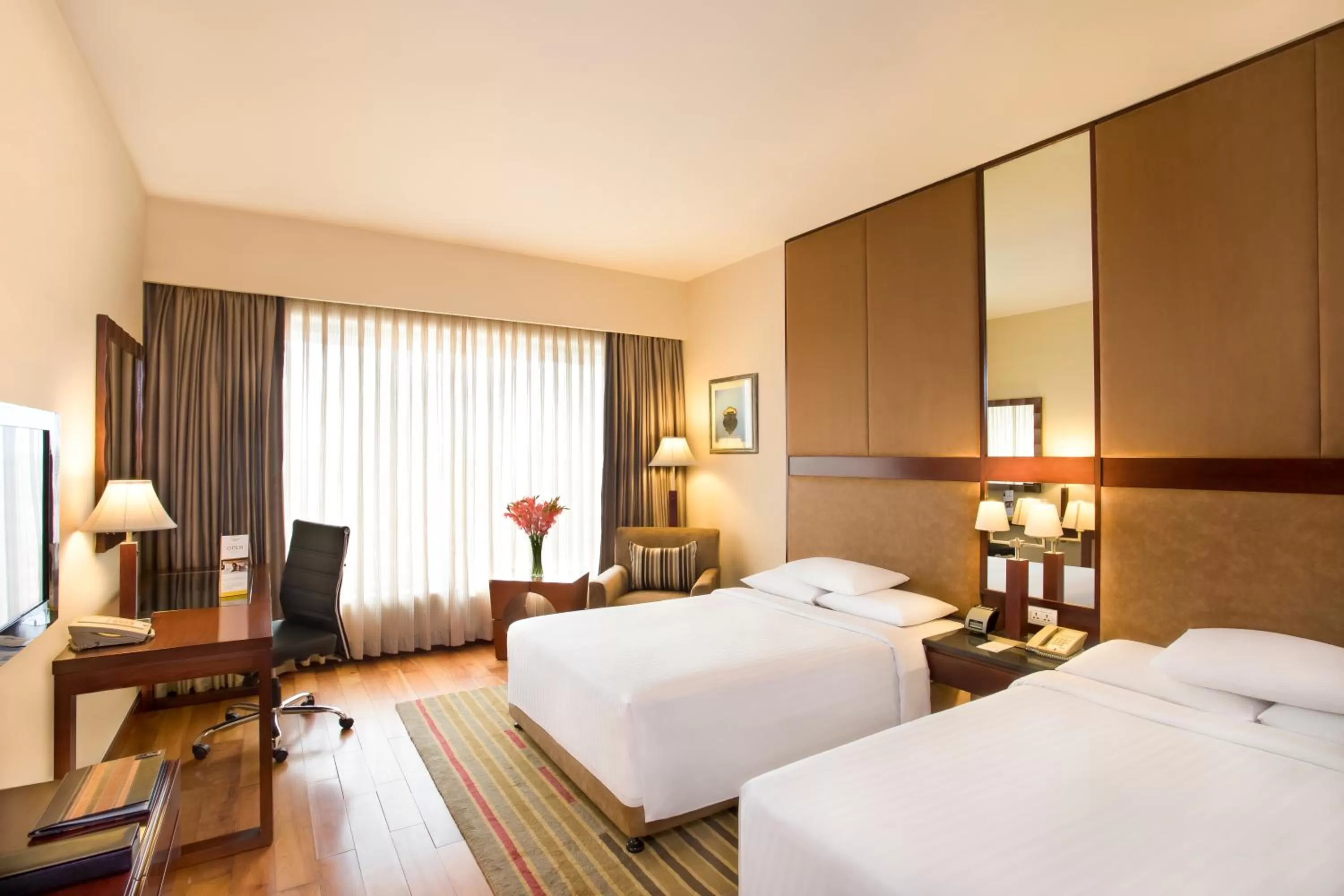 Bed in Courtyard by Marriott Ahmedabad