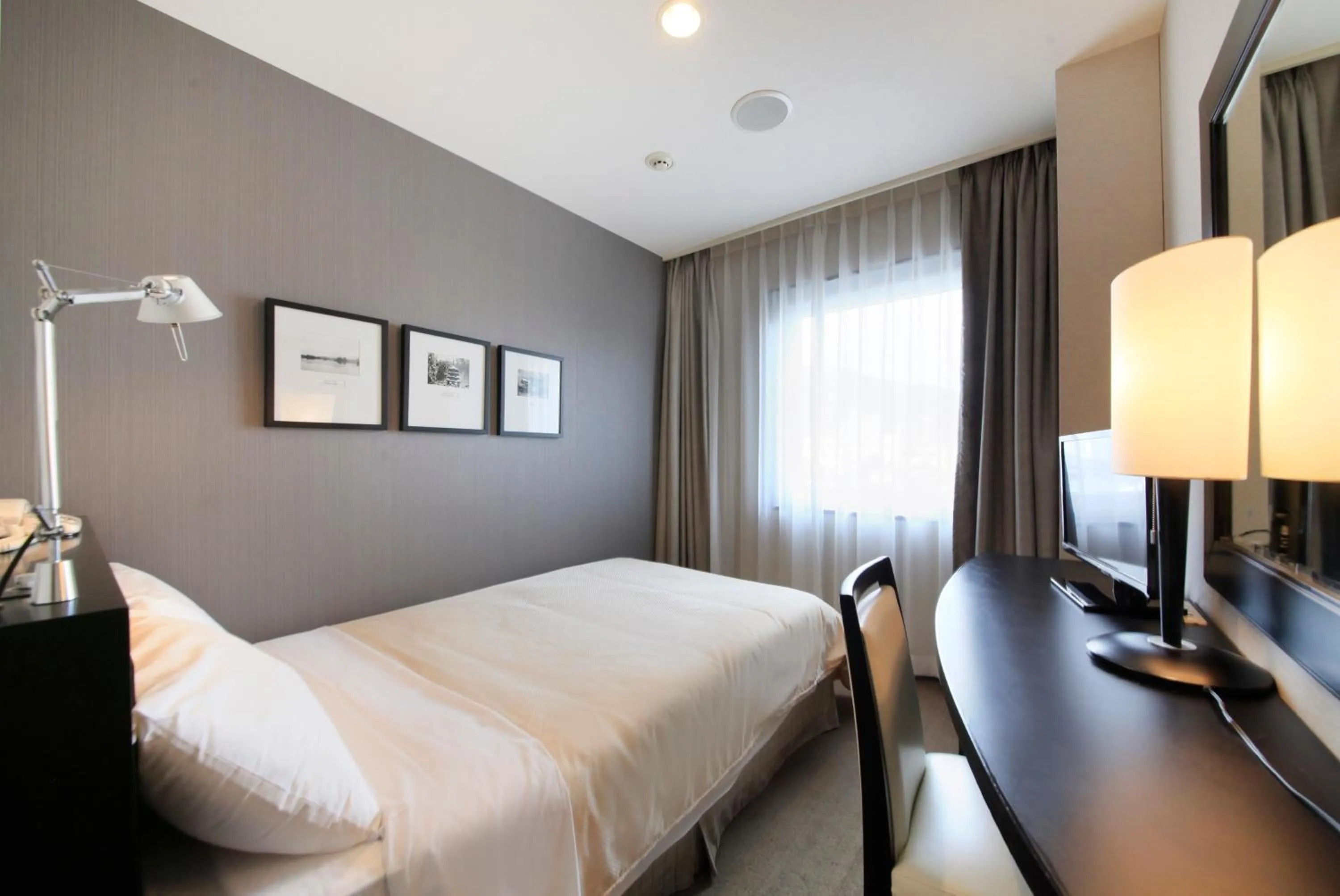 Photo of the whole room, Bed in Hotel Sunroute Ueda