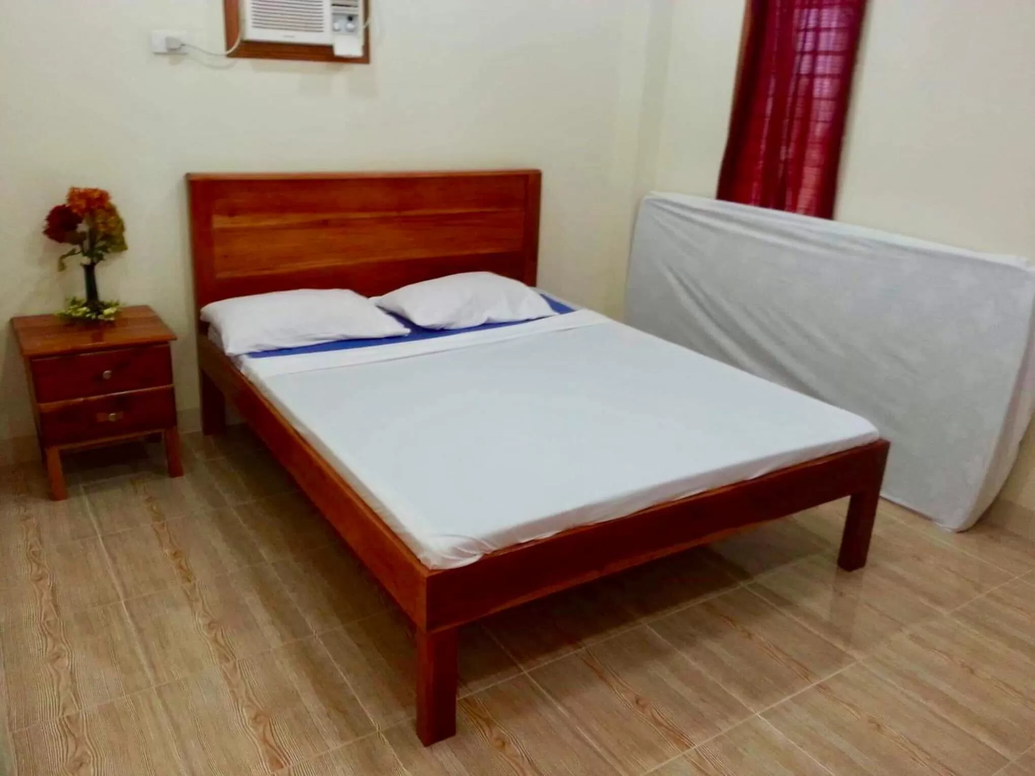 Bed in D's Oceanview Beach Resort