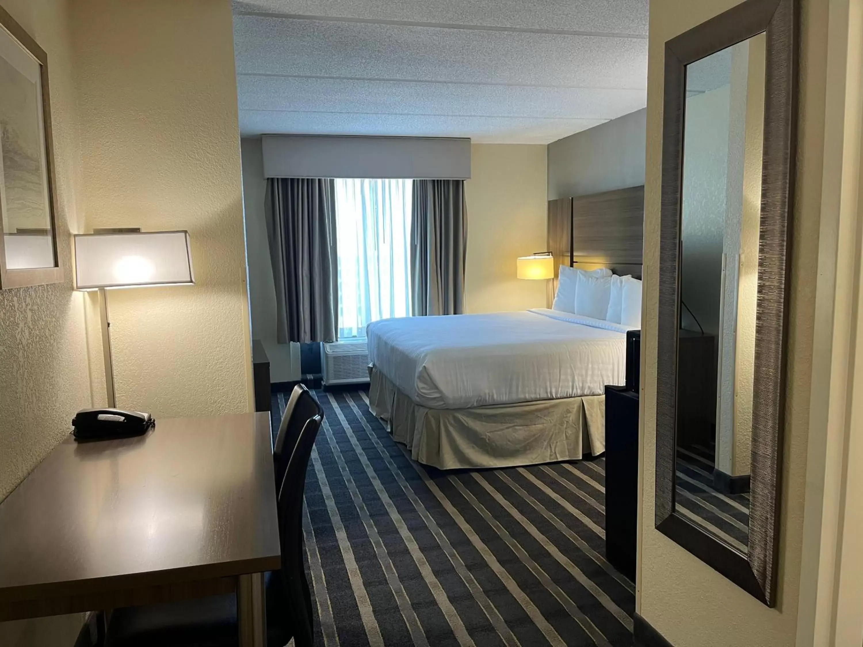 Bedroom, Bed in Sky Point Hotel & Suites - Atlanta Airport