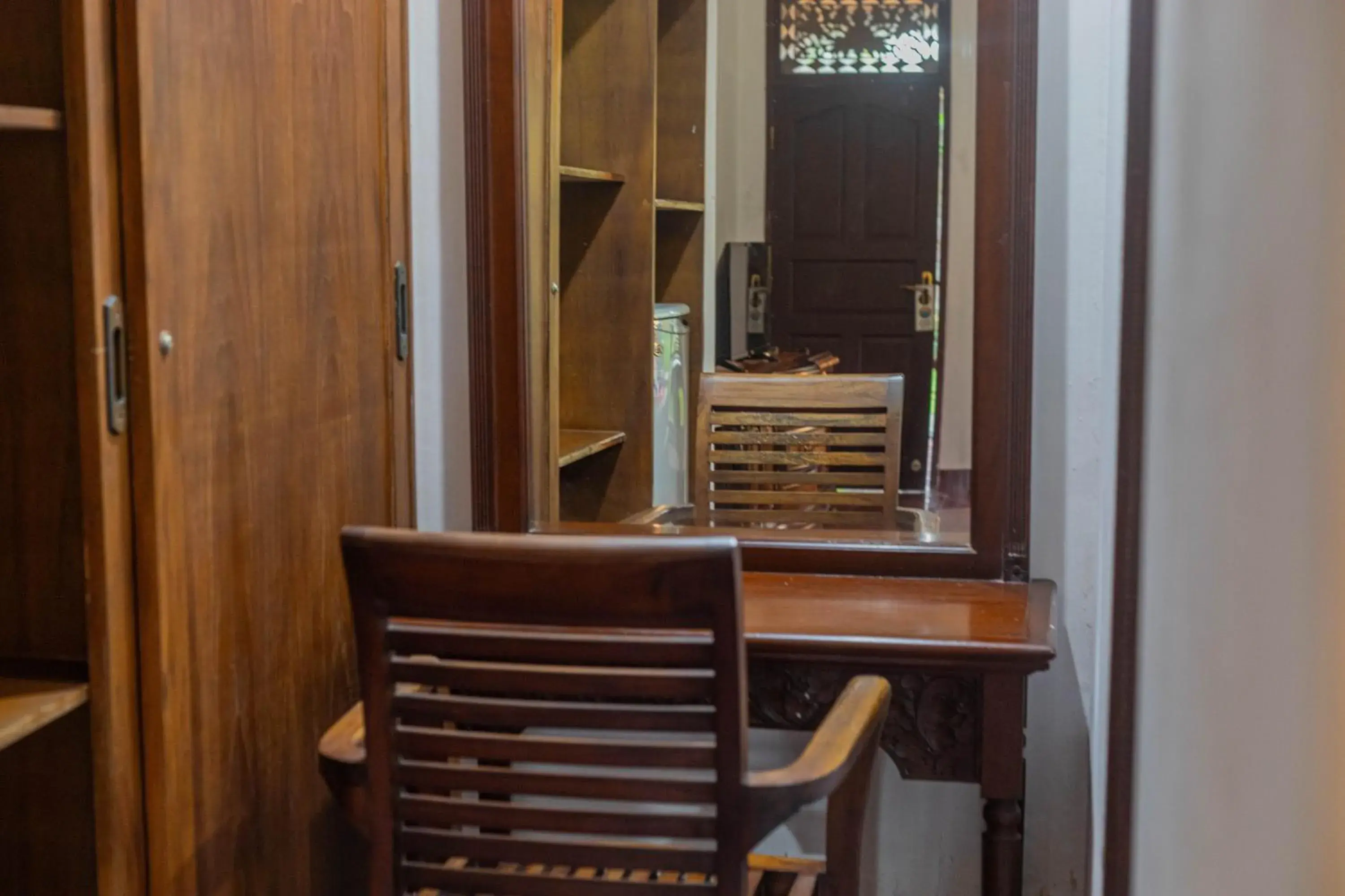 Seating area in OYO 3868 Puri Mango Hotel