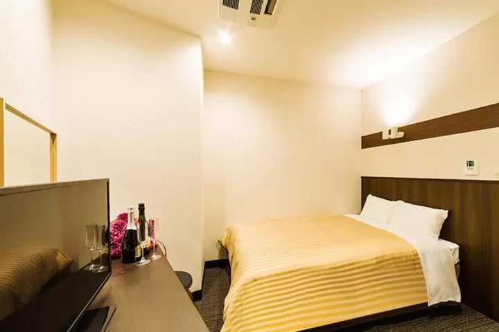 Bed in Hotel CASVI Tenjin