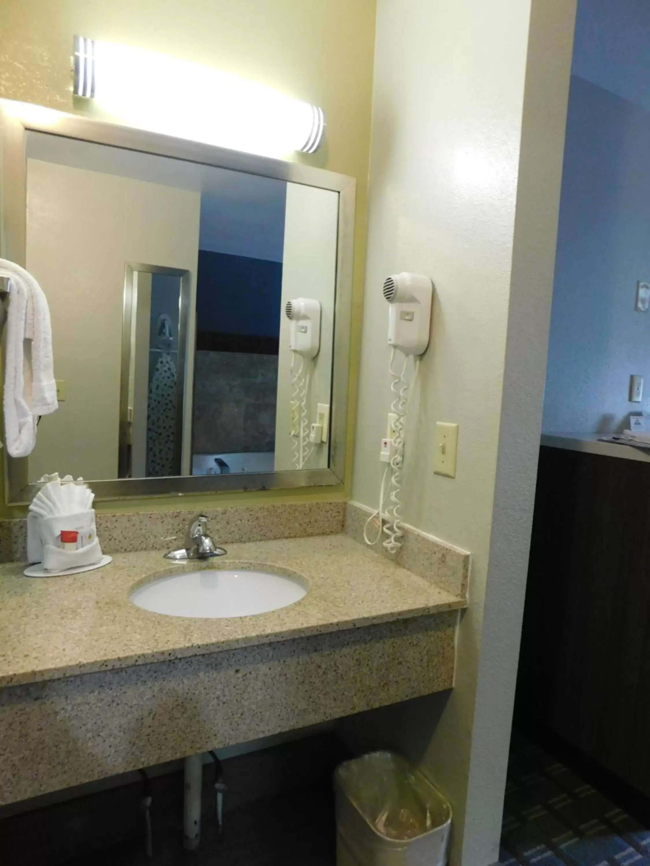 Bathroom in Days Inn & Suites by Wyndham Downtown Gatlinburg Parkway