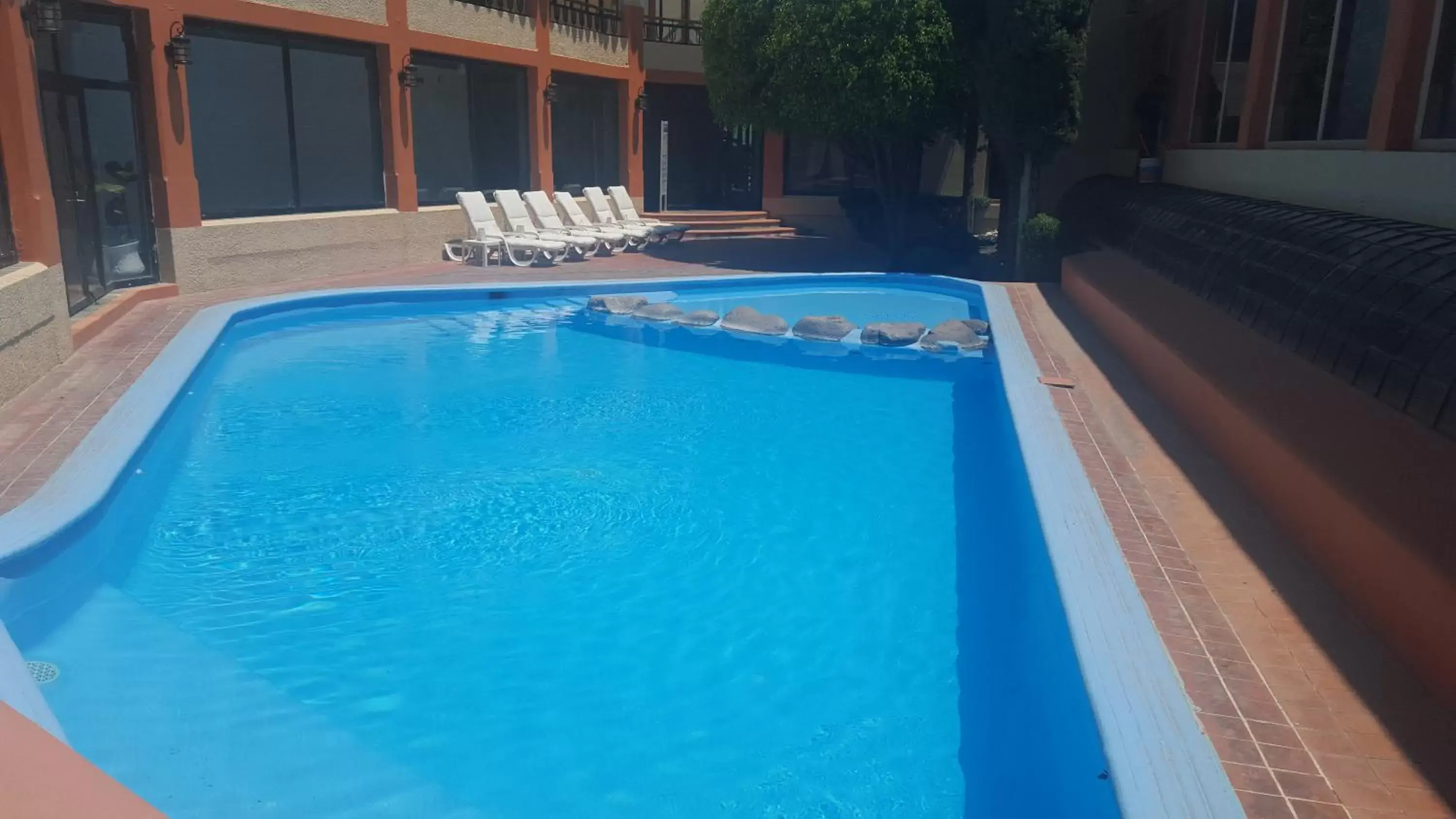 Property building, Swimming Pool in Hotel Paseo de la Presa