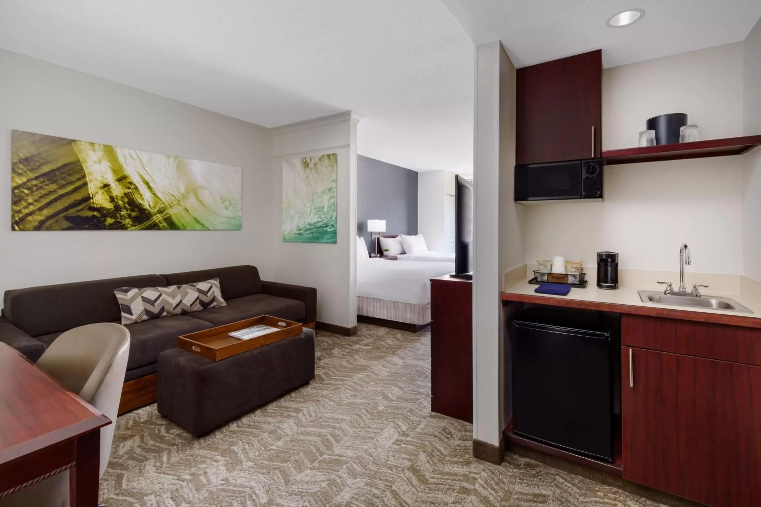 Bedroom, Kitchen/Kitchenette in SpringHill Suites Manchester-Boston Regional Airport