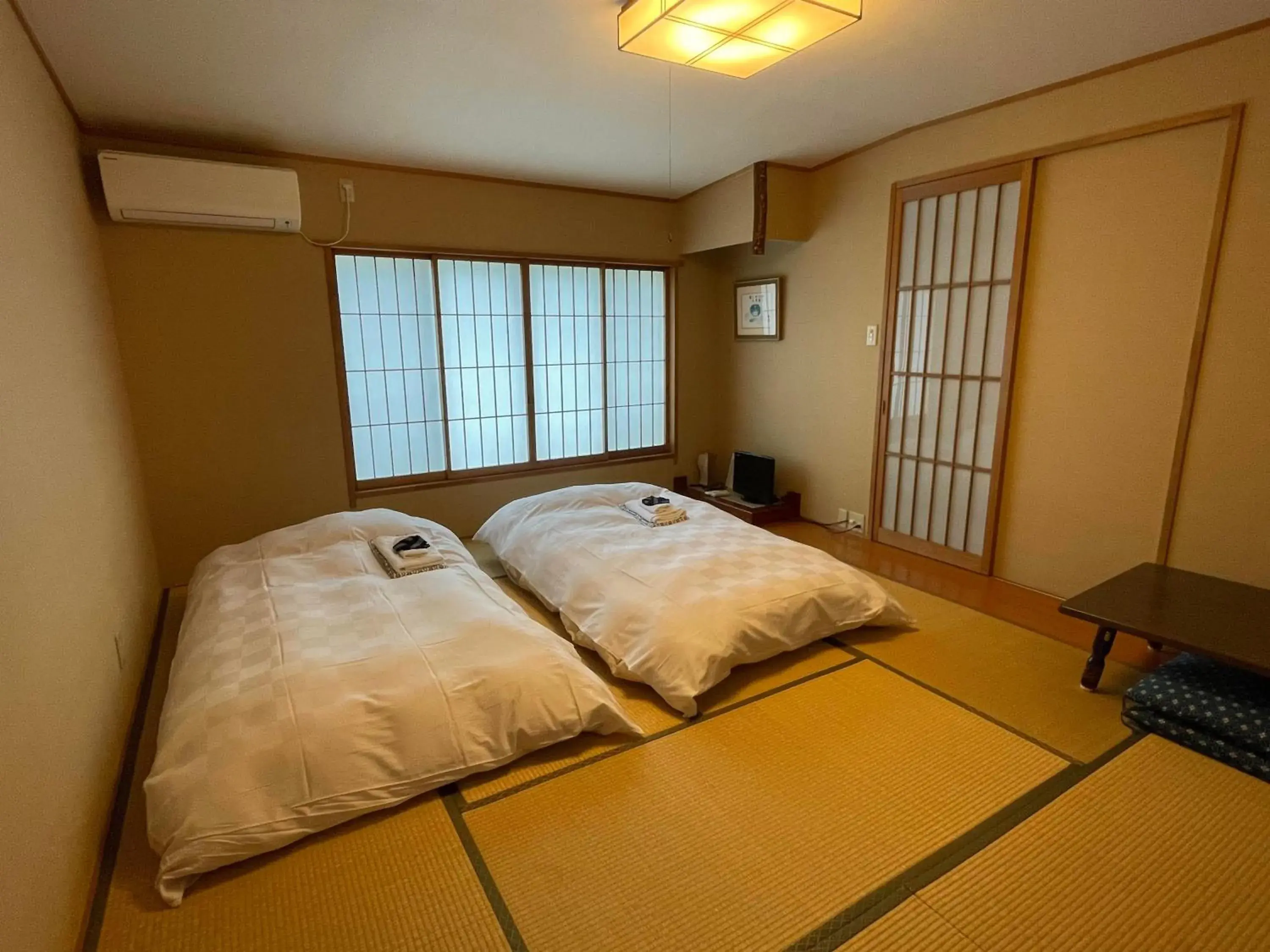 Bed in Hotel Fukudaya