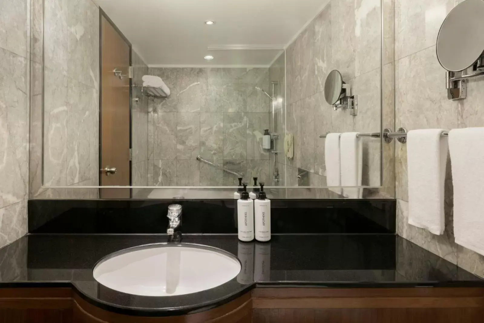 Shower, Bathroom in voco Orchard Singapore, an IHG Hotel