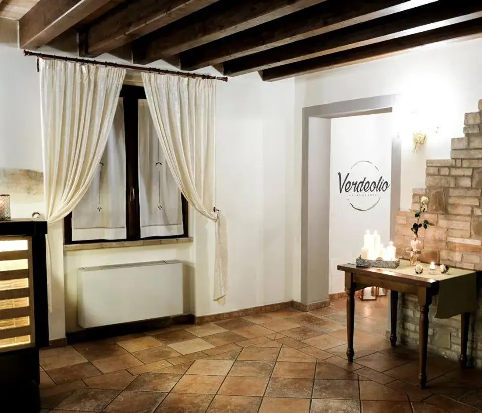 Communal lounge/ TV room in Relais Madonna di Campagna
