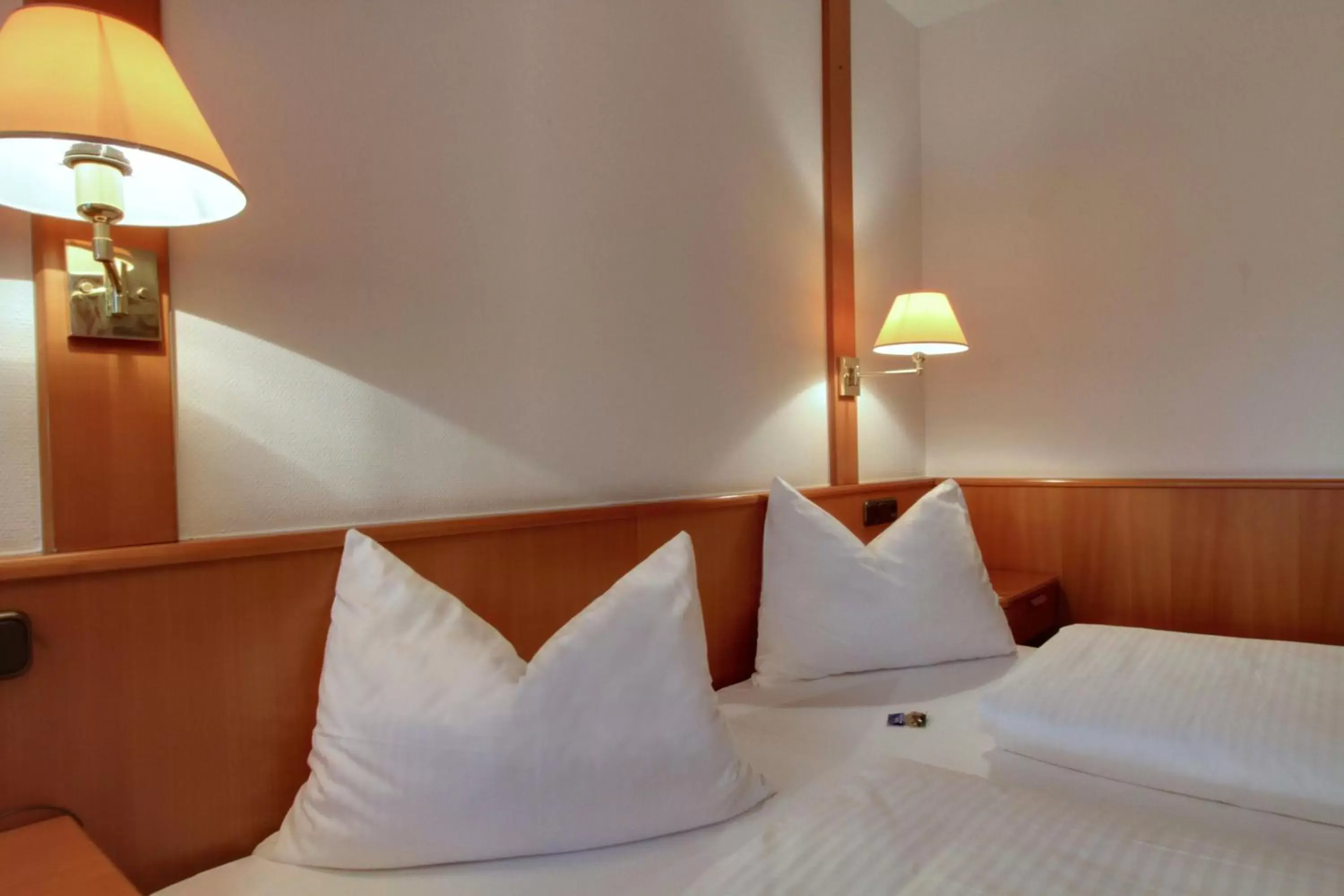 Bed in ACHAT Hotel Wetzlar