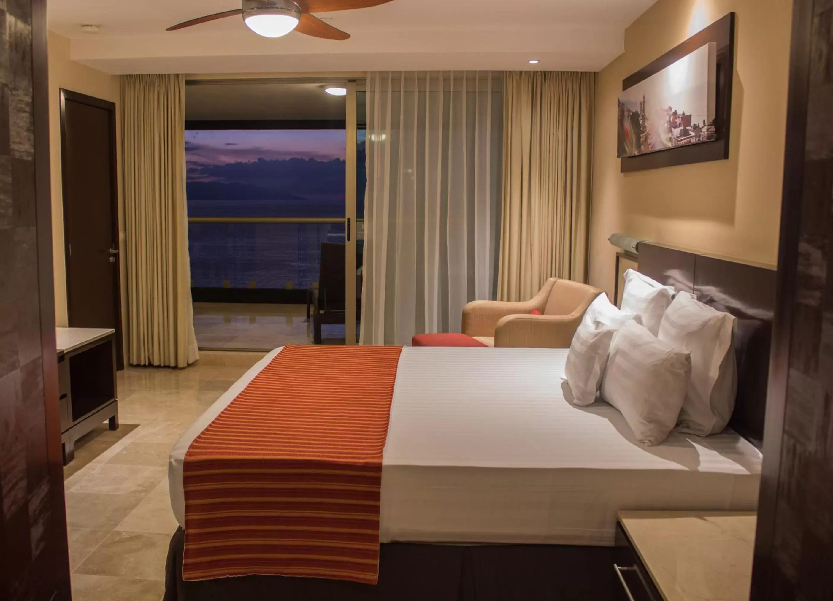 Balcony/Terrace, Bed in Sunset Plaza Beach Resort Puerto Vallarta All Inclusive