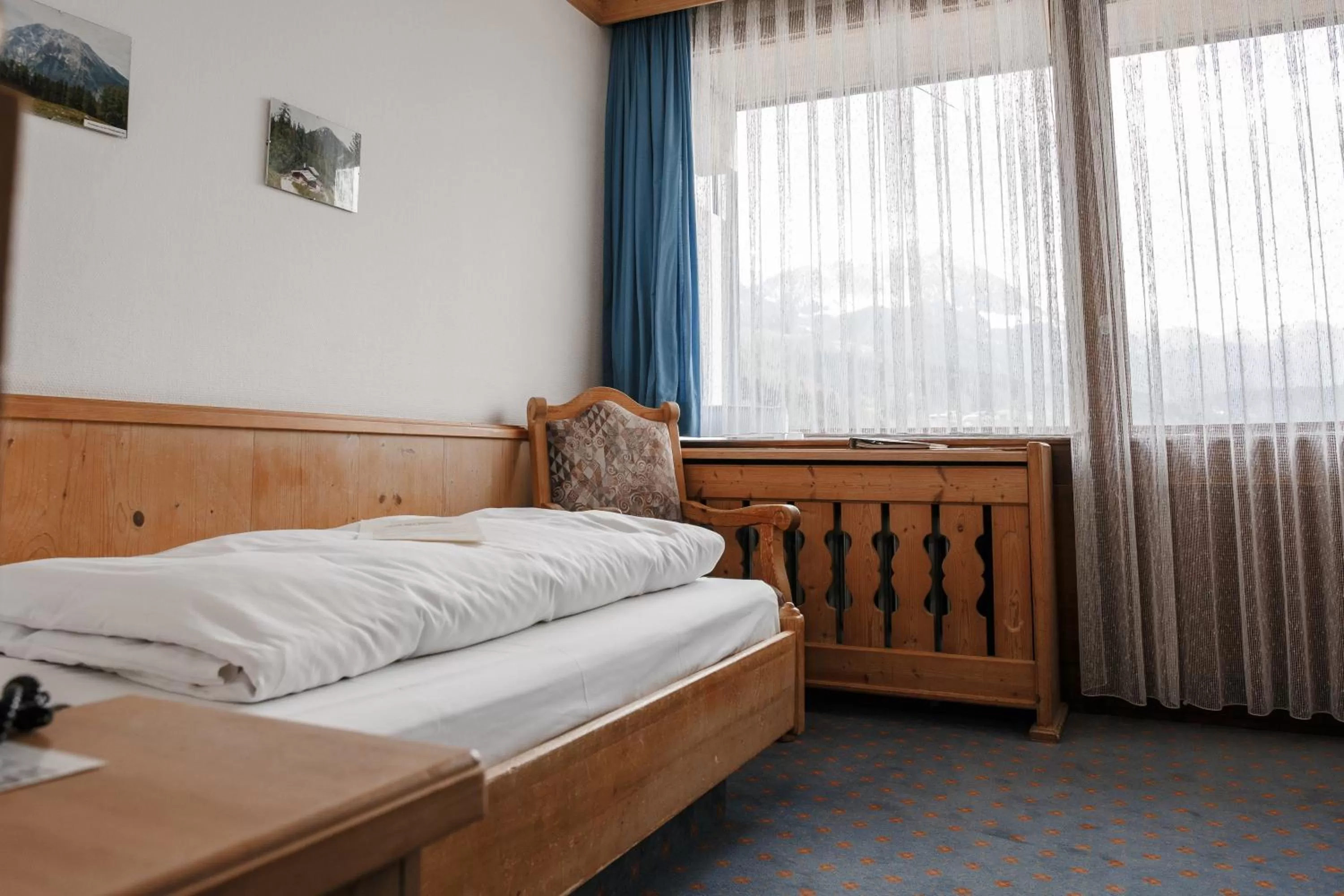 Bed in Hotel Vier Jahreszeiten