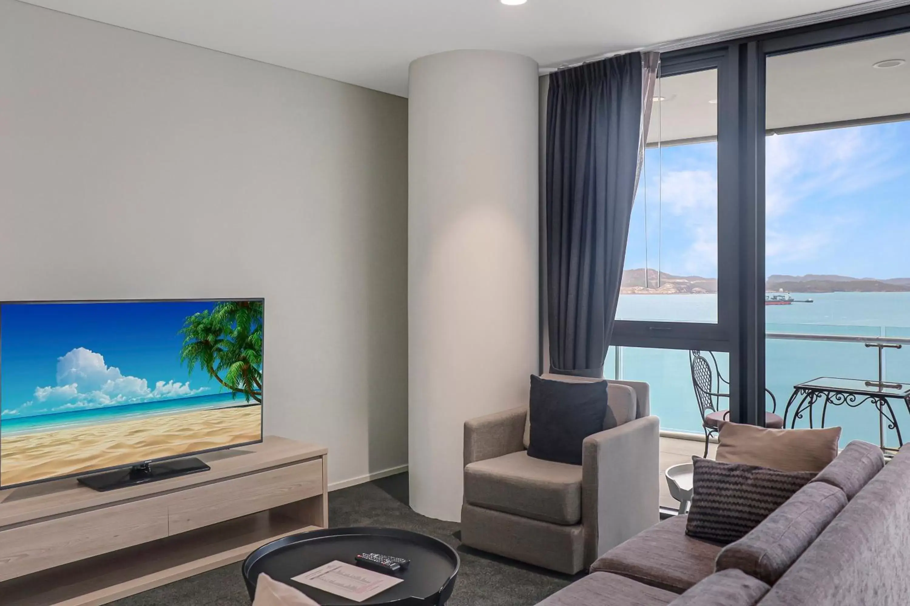 Photo of the whole room, TV/Entertainment Center in Crowne Plaza Residences Port Moresby, an IHG Hotel