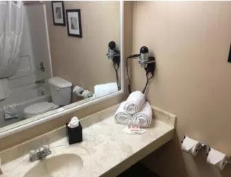 Bathroom in Days Inn & Suites by Wyndham Sellersburg