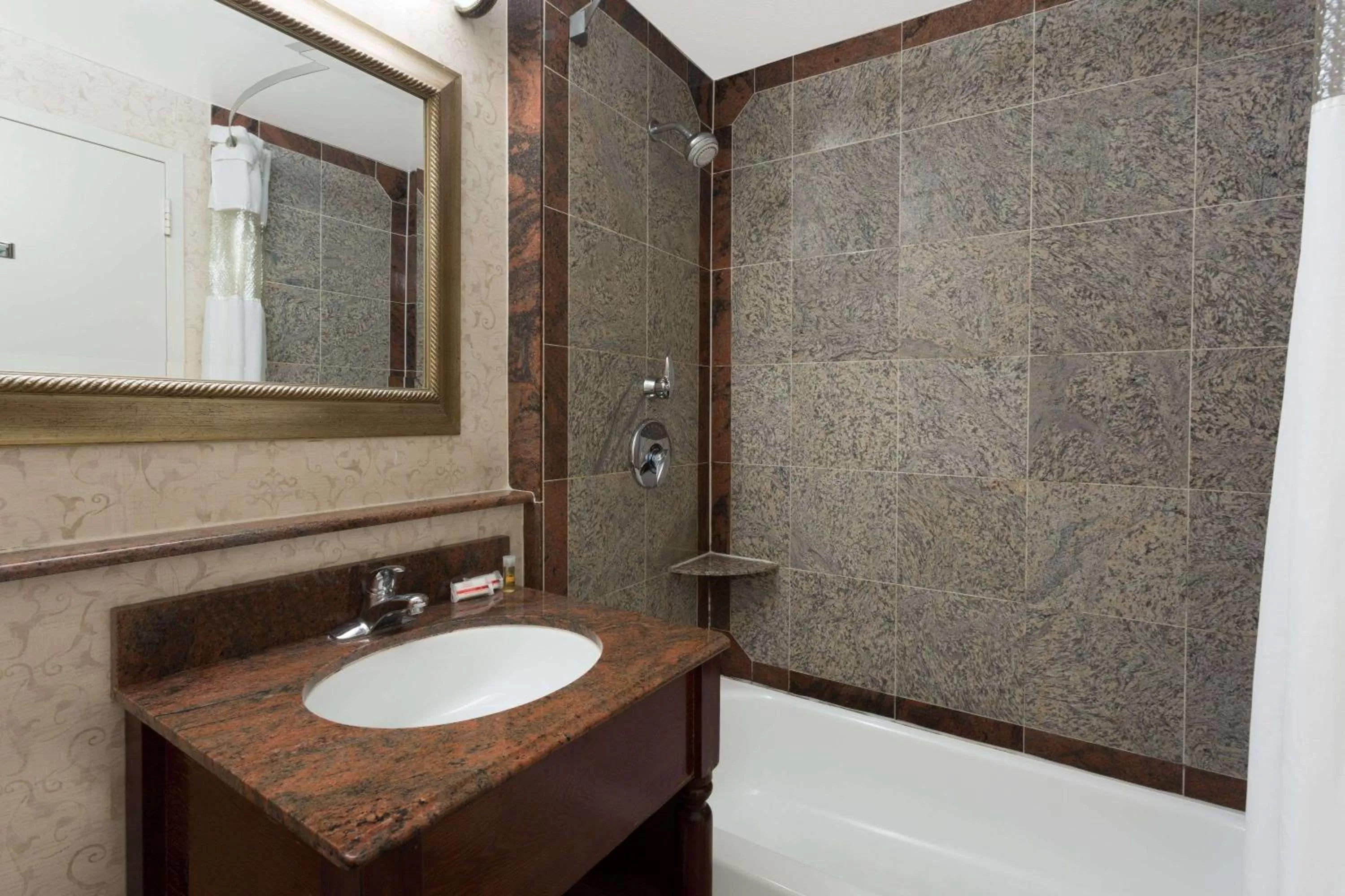 Bathroom in Days Inn by Wyndham Lanham Washington DC