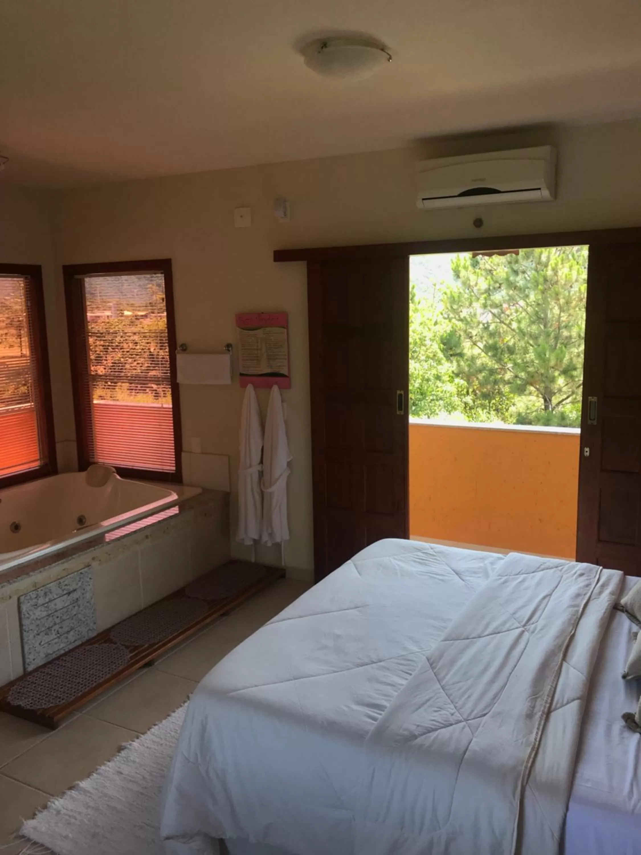 Bed in Pousada Ilha dos Anjos