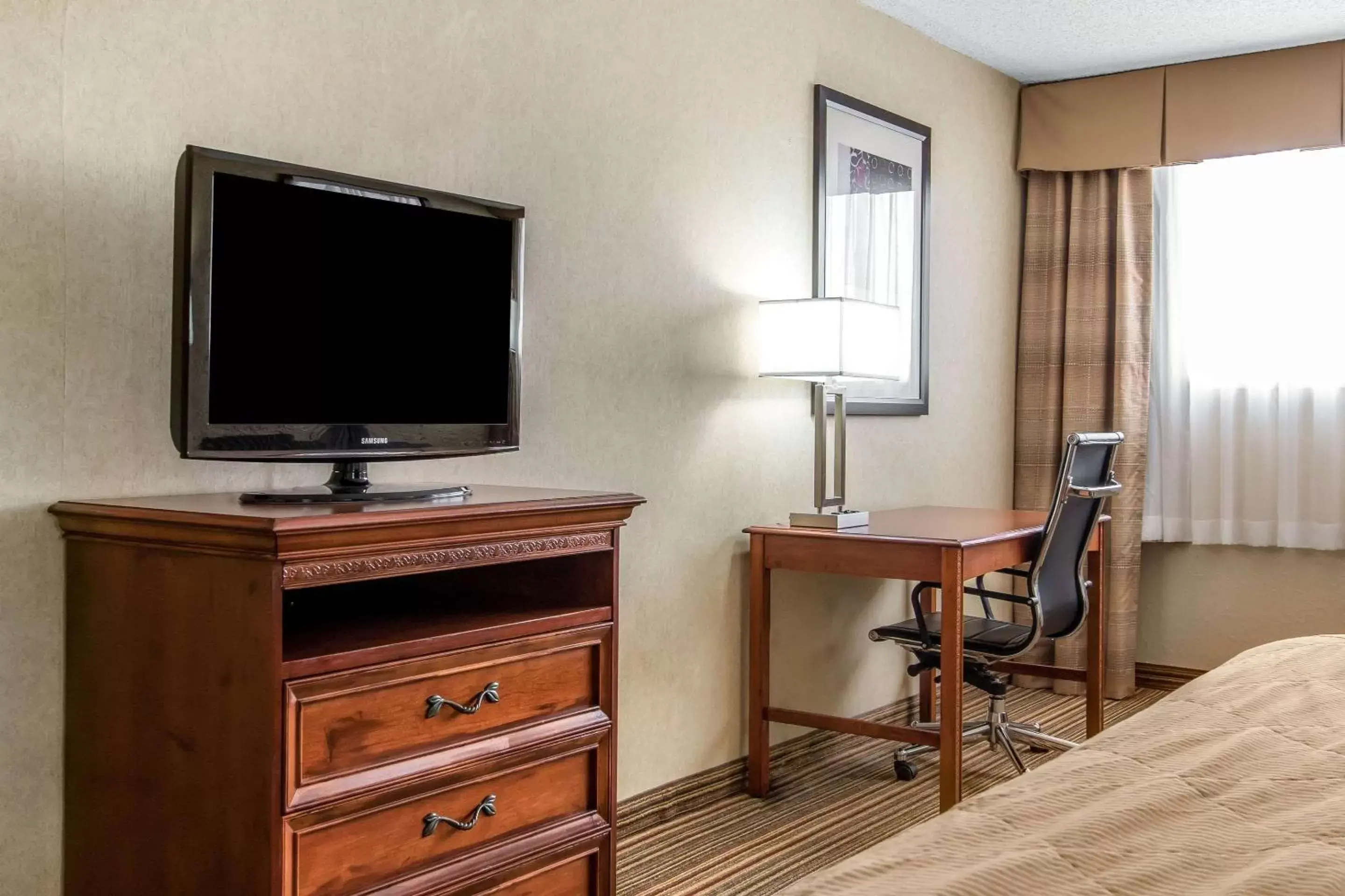 Photo of the whole room, TV/Entertainment Center in Clarion Hotel Broken Arrow - Tulsa