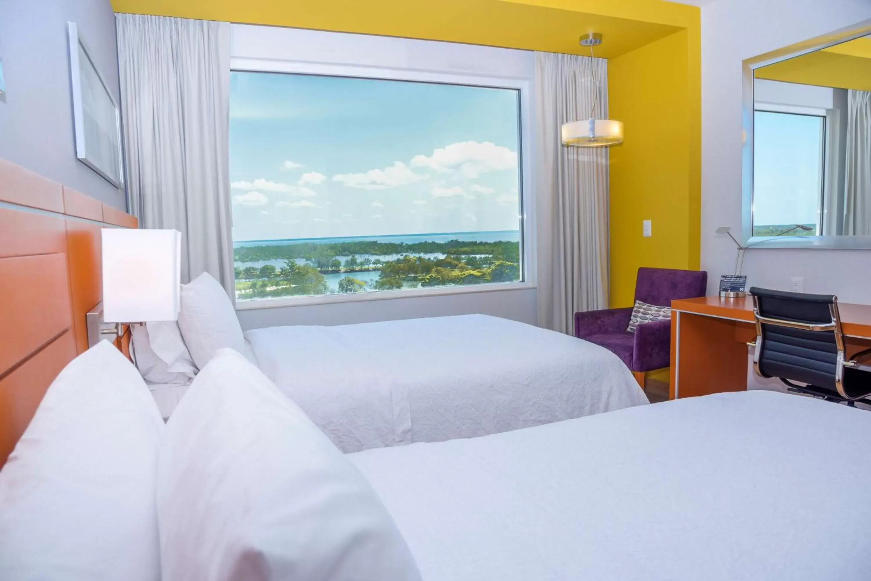 Bed in Hampton Inn & Suites by Hilton Paraiso Bed in Hampton Inn & Suites by Hilton Paraiso