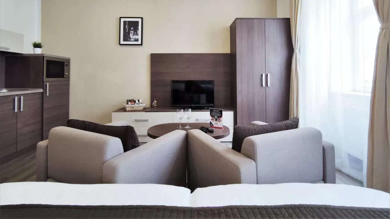 TV and multimedia, Seating Area in Hotel Residence Spalena