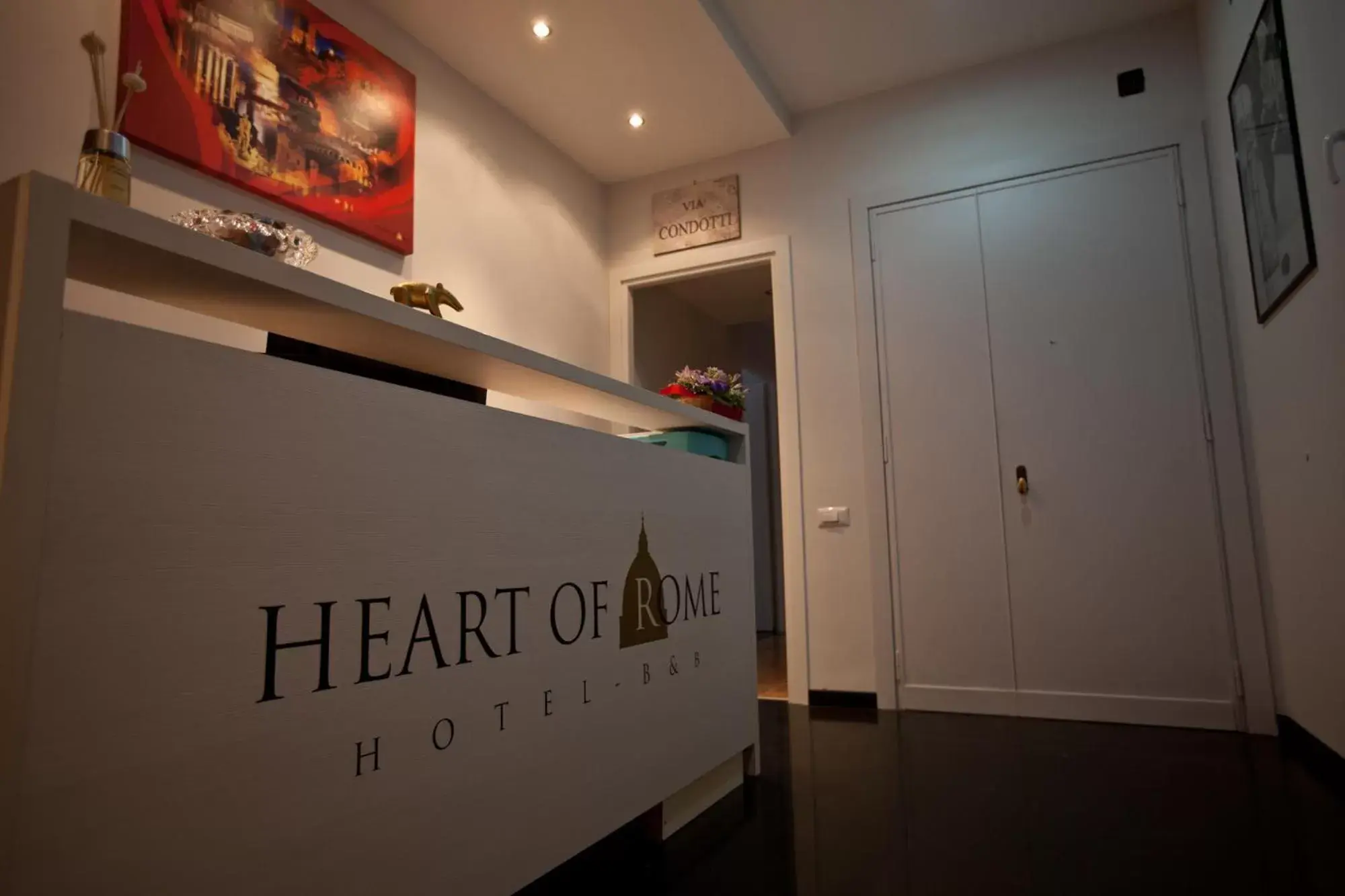 Lobby or reception, Property Logo/Sign in Heart of Rome Rooms
