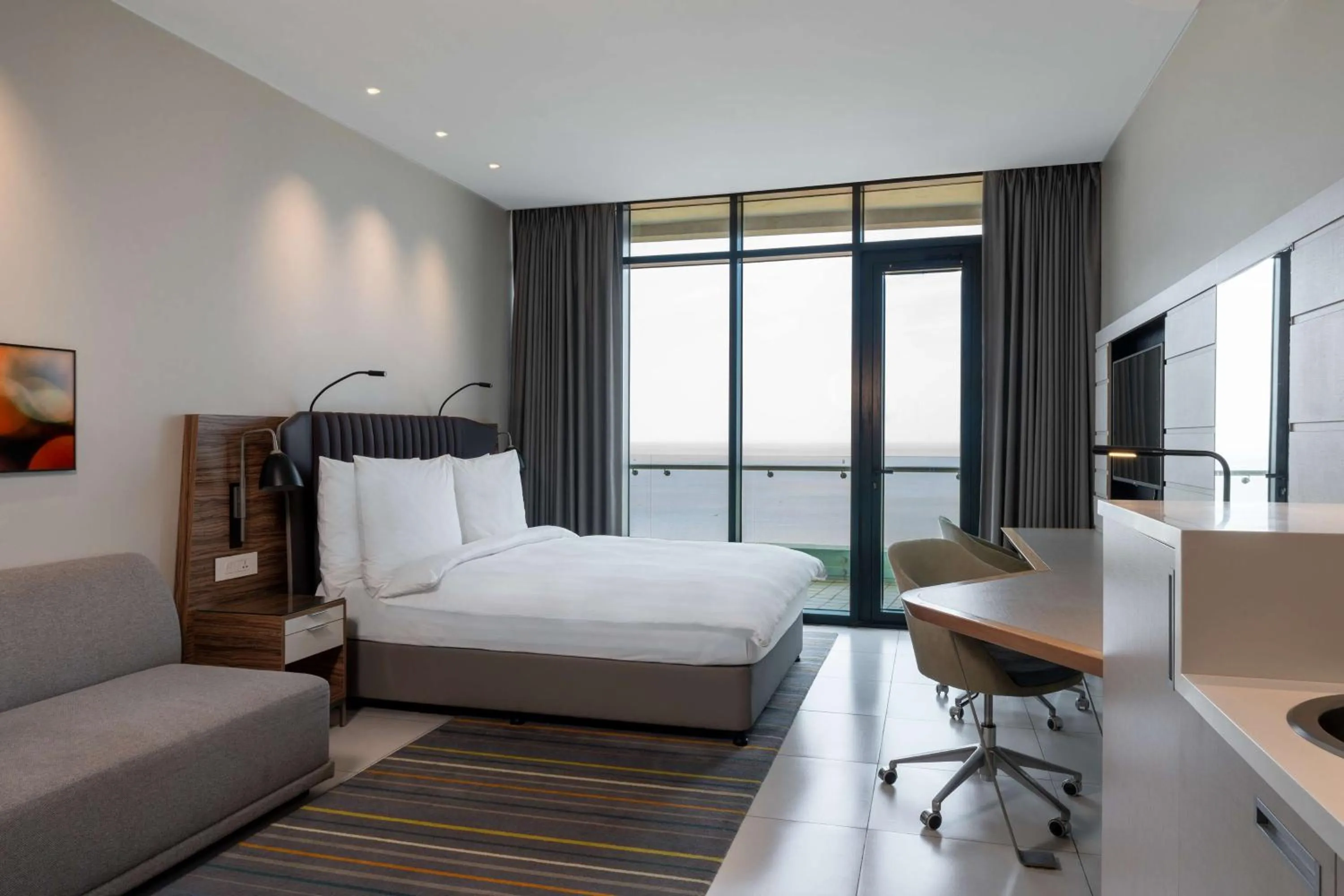 Photo of the whole room, Bed in Radisson Blu Hotel & Residence Maputo