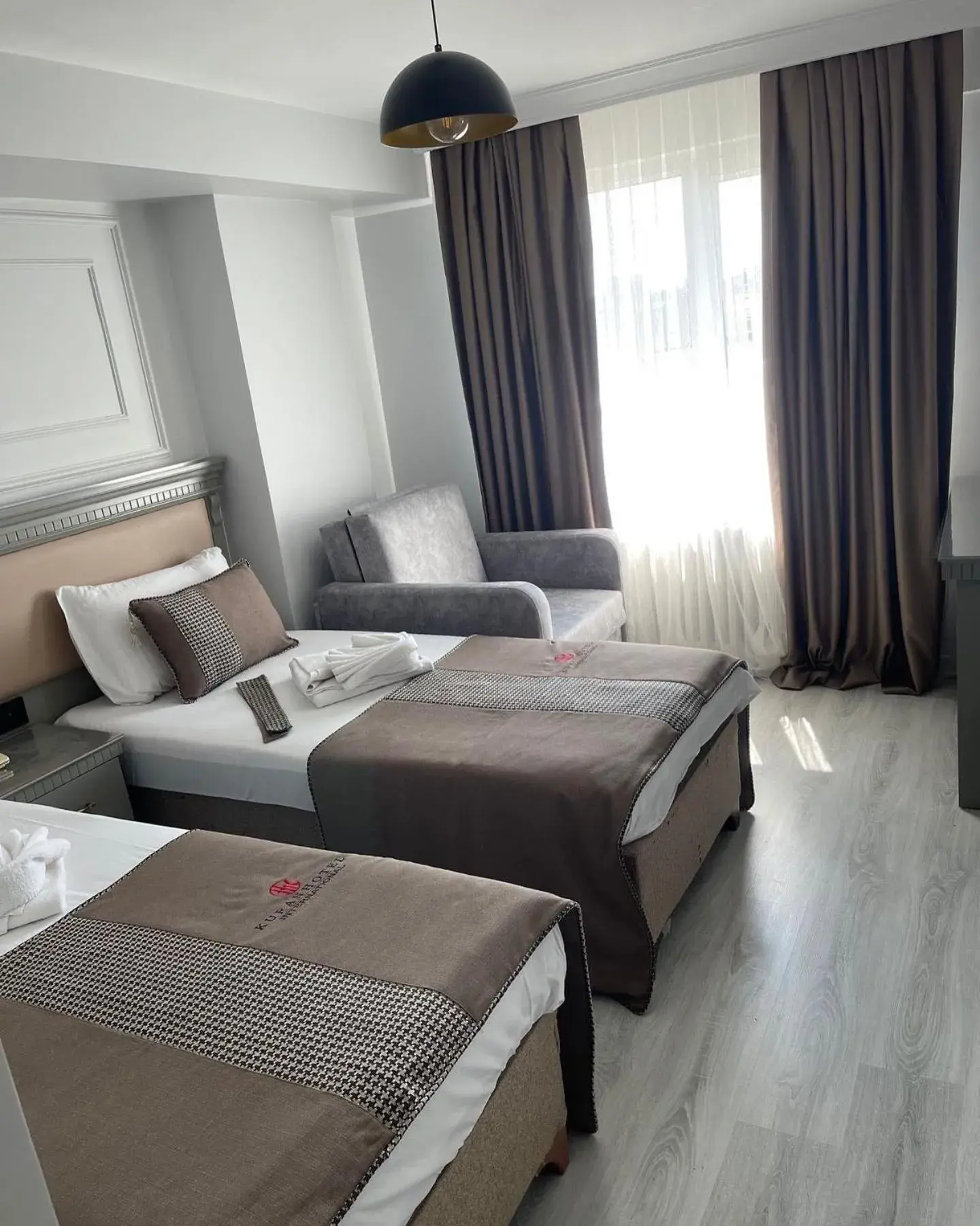Bed in Kuran Hotel International