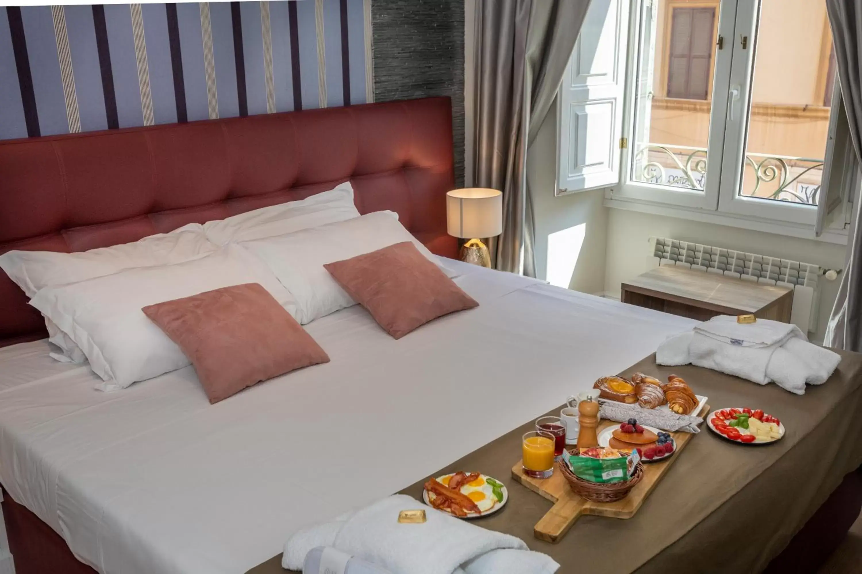 Food and drinks, Bed in Vatican Suites - The Luxury Leading Accommodation in Rome
