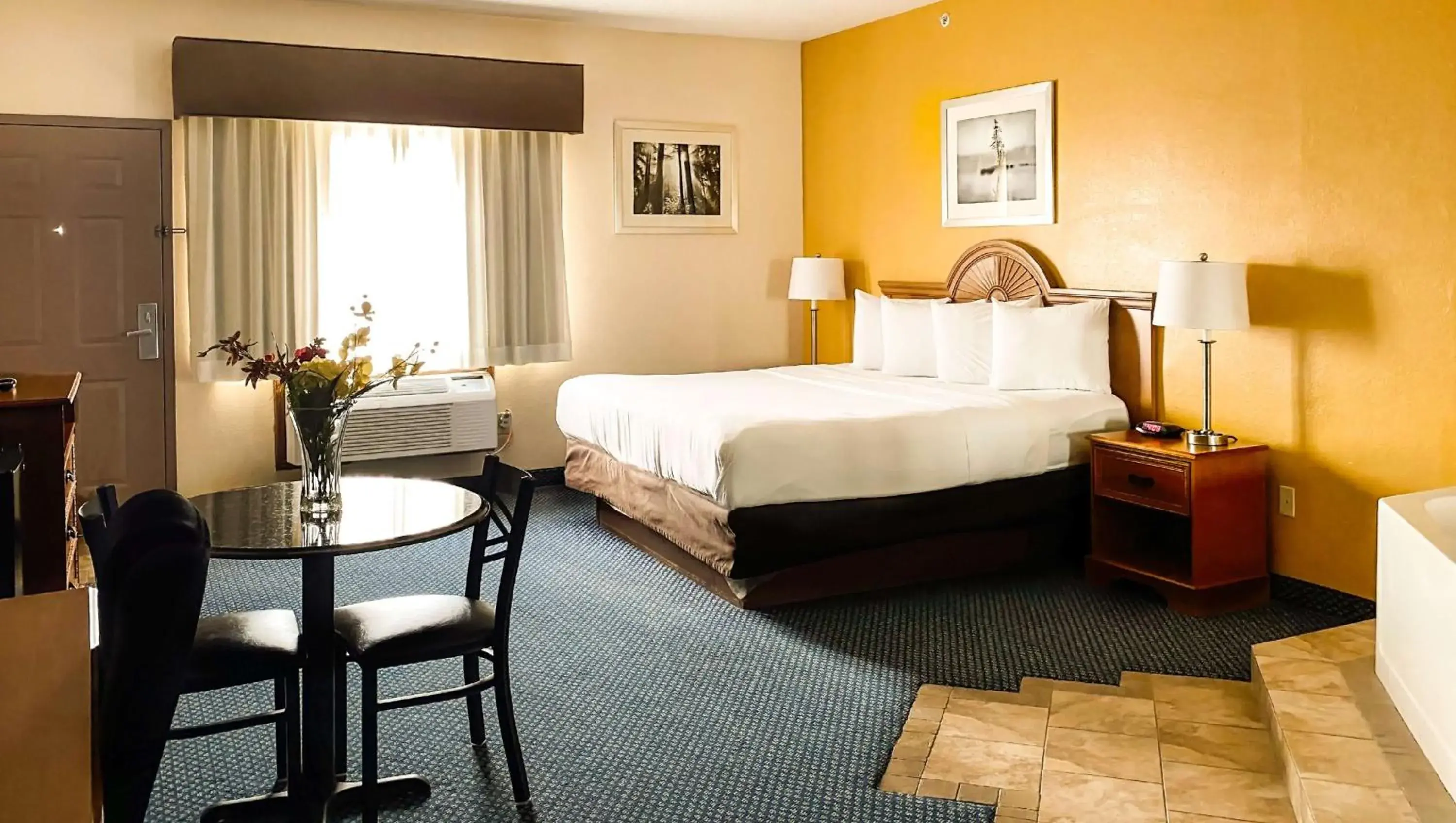 Photo of the whole room, Bed in Magnuson Hotel Sand Springs-Tulsa West