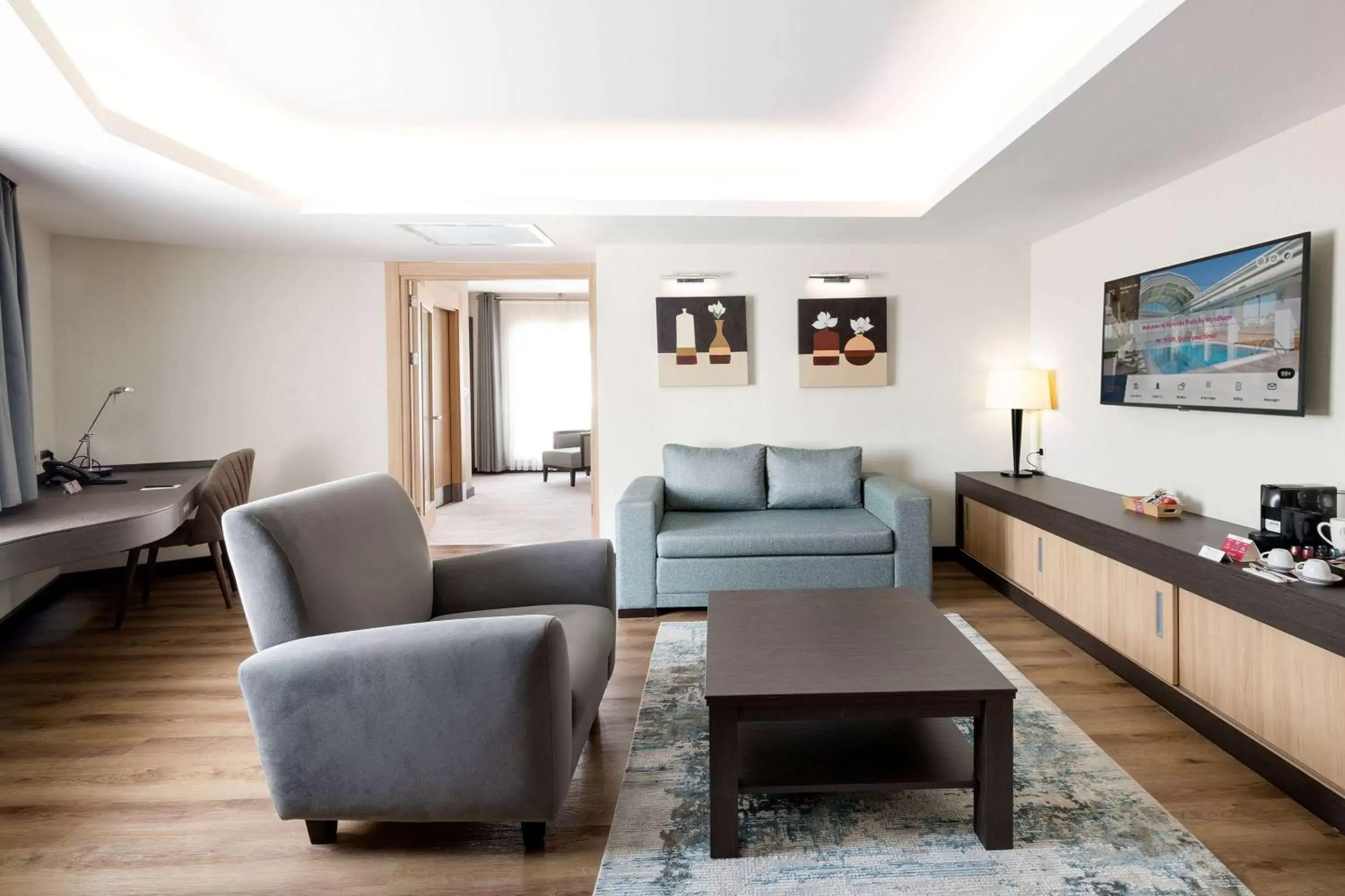 Photo of the whole room, Seating Area in Ramada Plaza By Wyndham Istanbul City Center