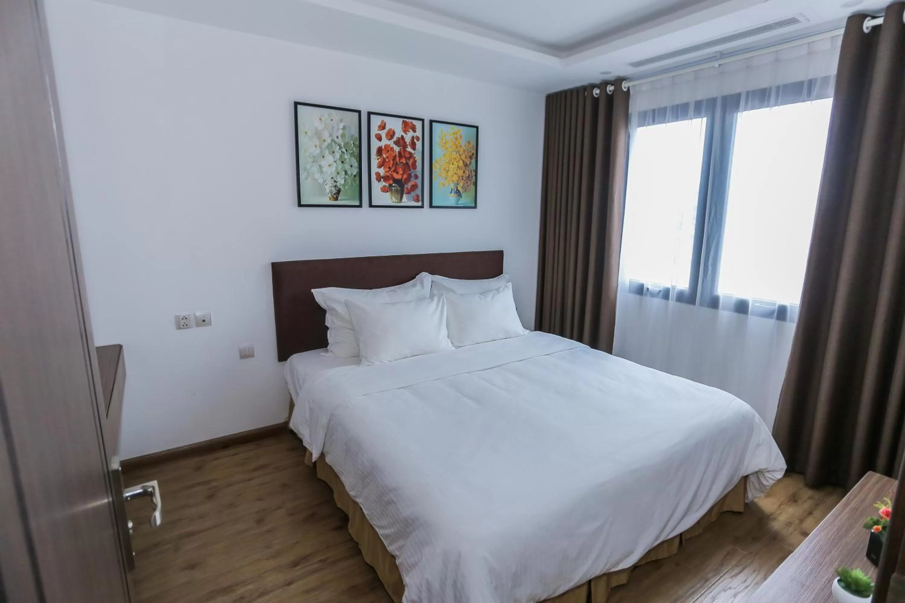 Bed in HNC Premier Hotel & Residences