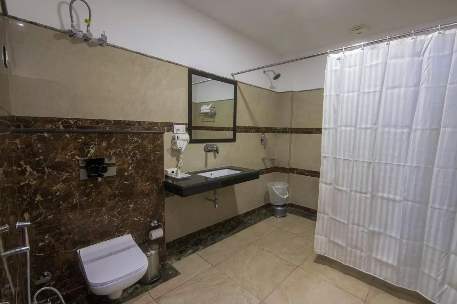 Bathroom in Shivaay Morex- A Vegetarian Hotel