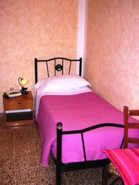 Bed in Hotel Bolognese