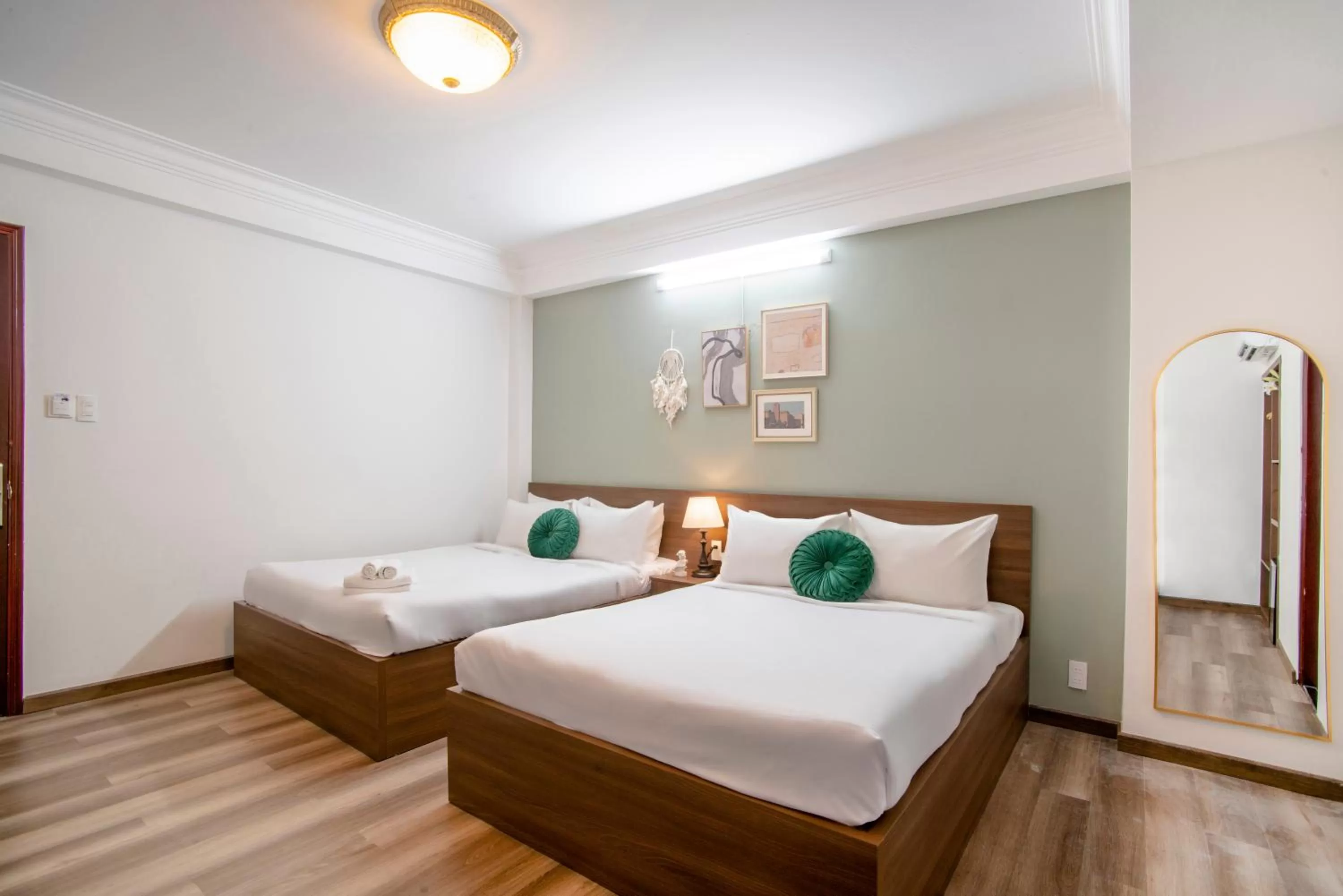 Bed in SAZI BEN THANH Hotel HCM