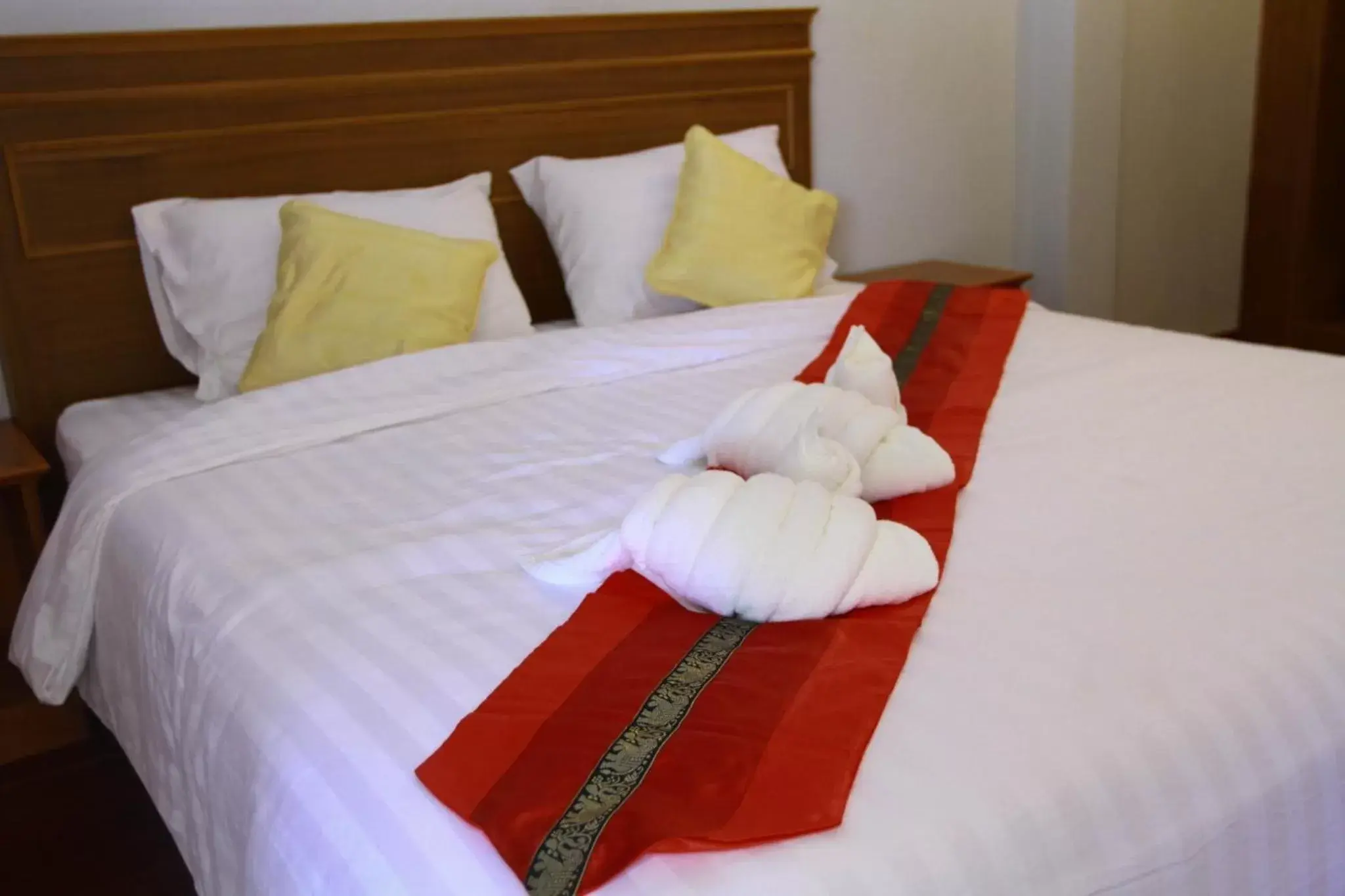 Bed in Hugpua Hotel