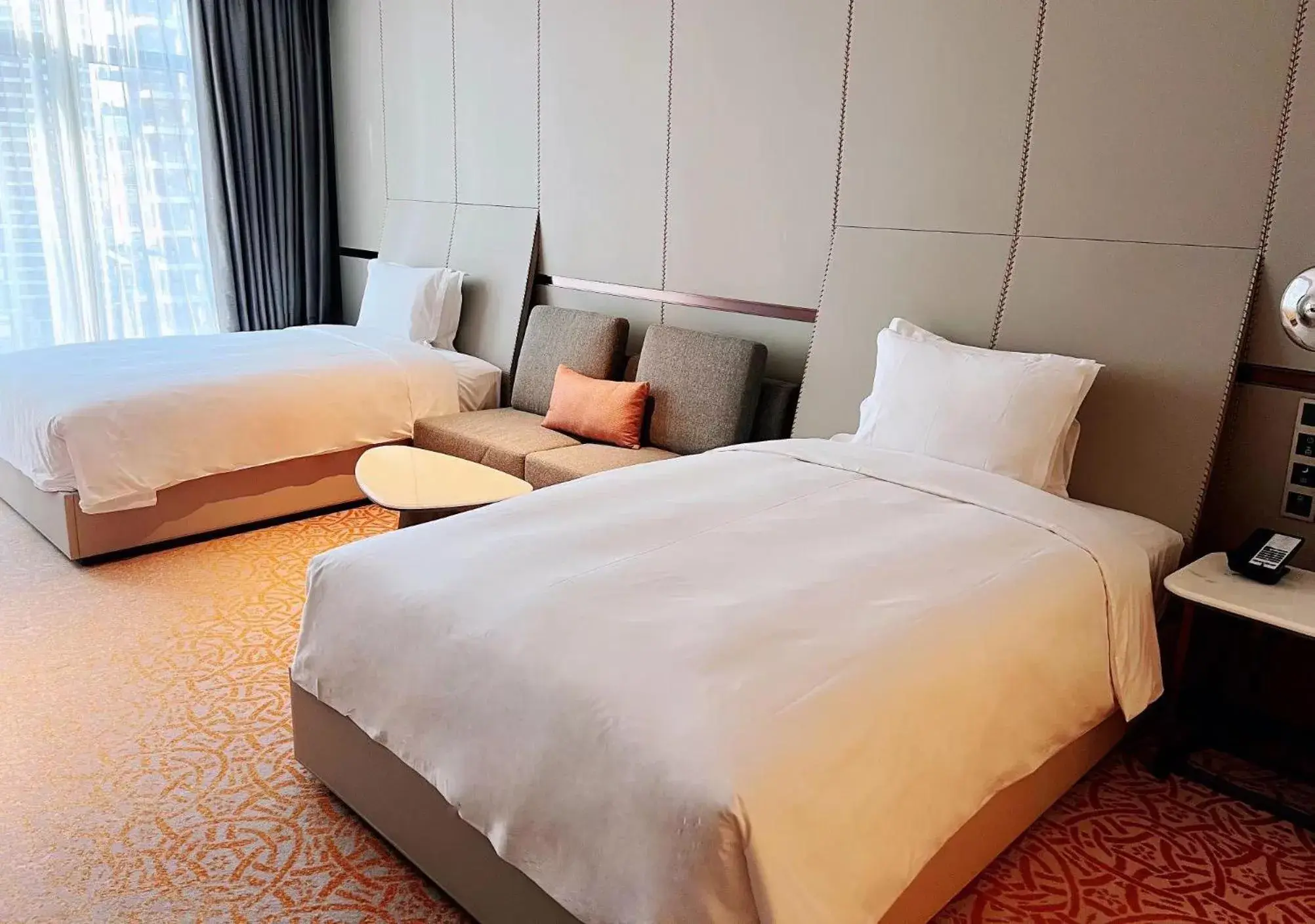 Bed in Crowne Plaza Qingdao Jinshui by IHG Bed in Crowne Plaza Qingdao Jinshui by IHG