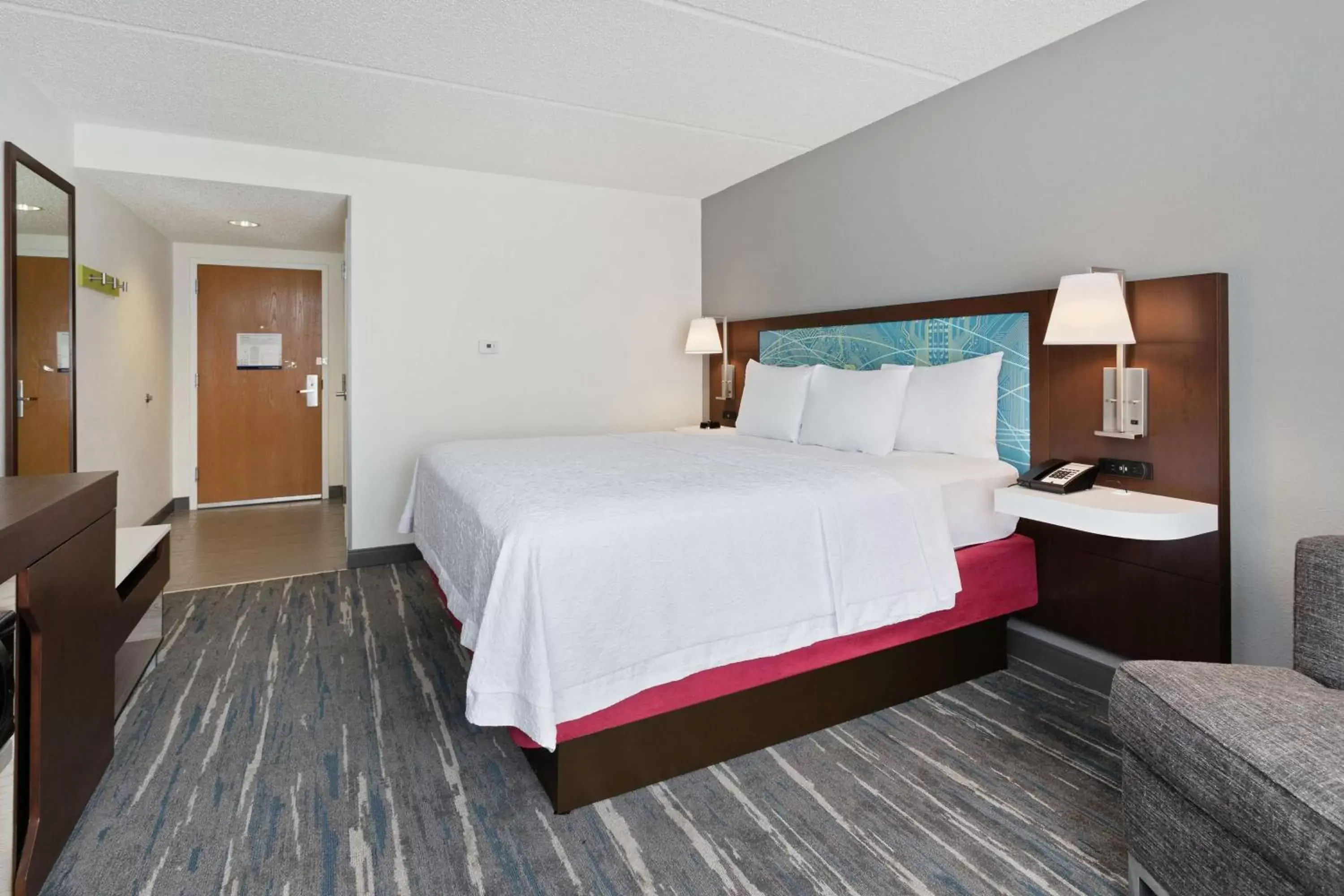Living room, Bed in Hampton Inn & Suites Orlando International Drive North