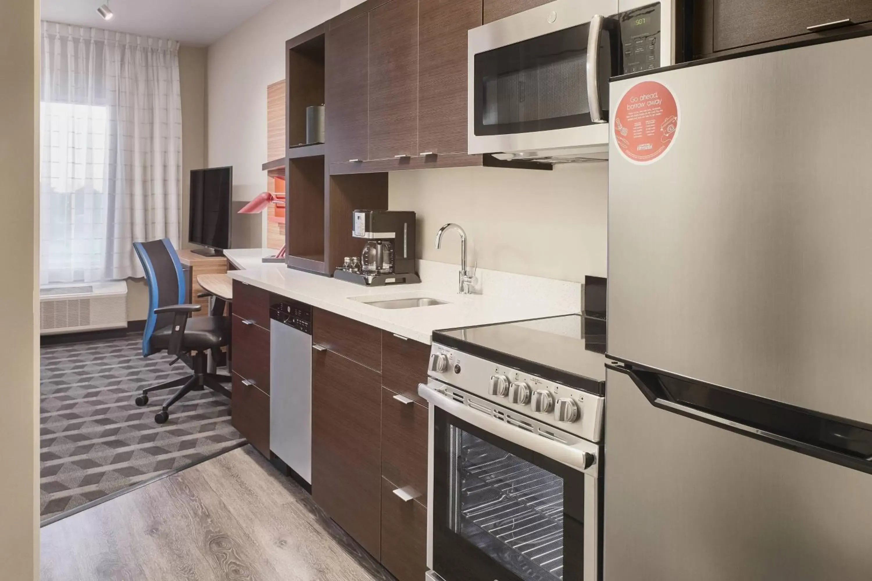 Bedroom, Kitchen/Kitchenette in TownePlace Suites by Marriott Medicine Hat