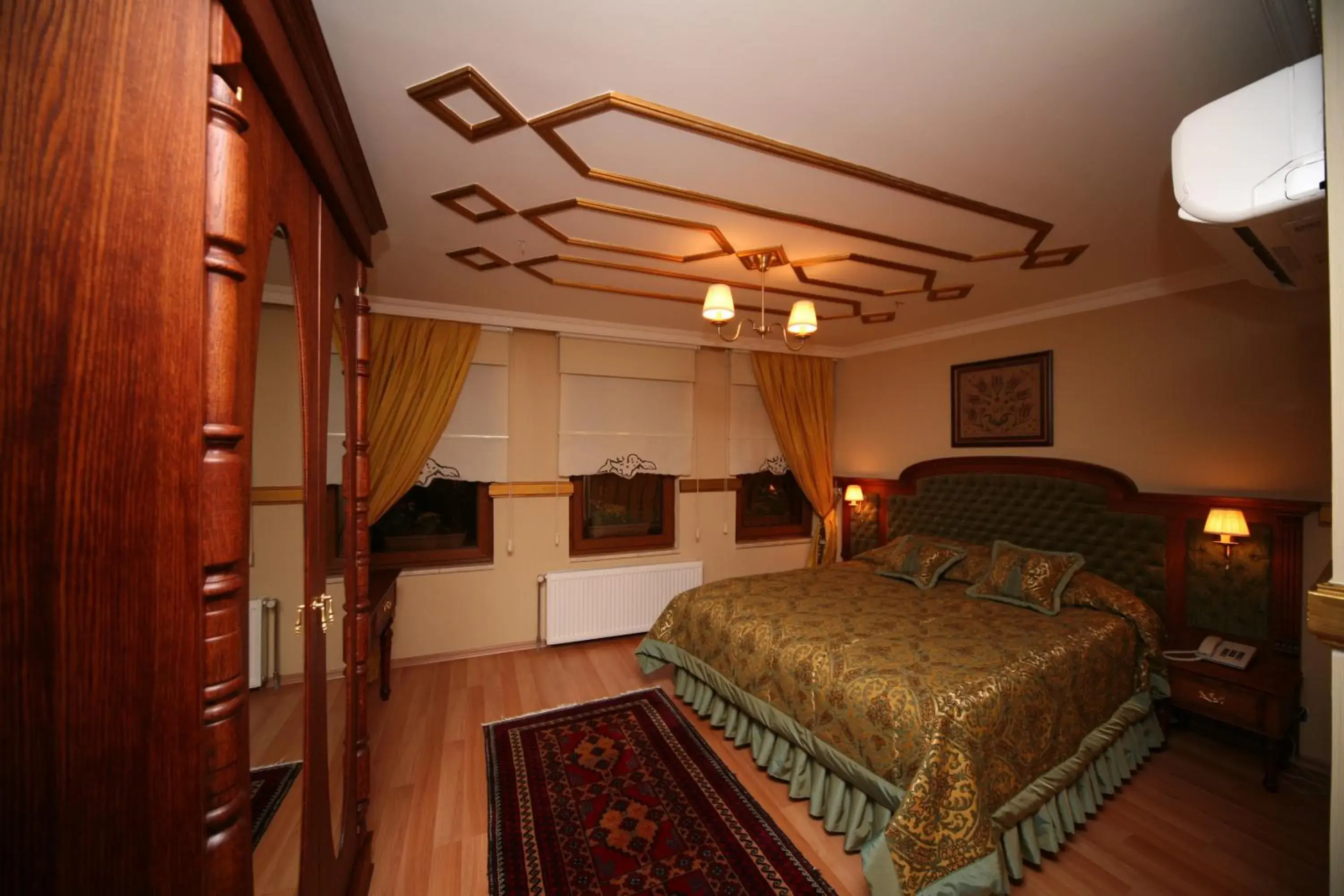Photo of the whole room, Bed in Aruna Boutique Hotel