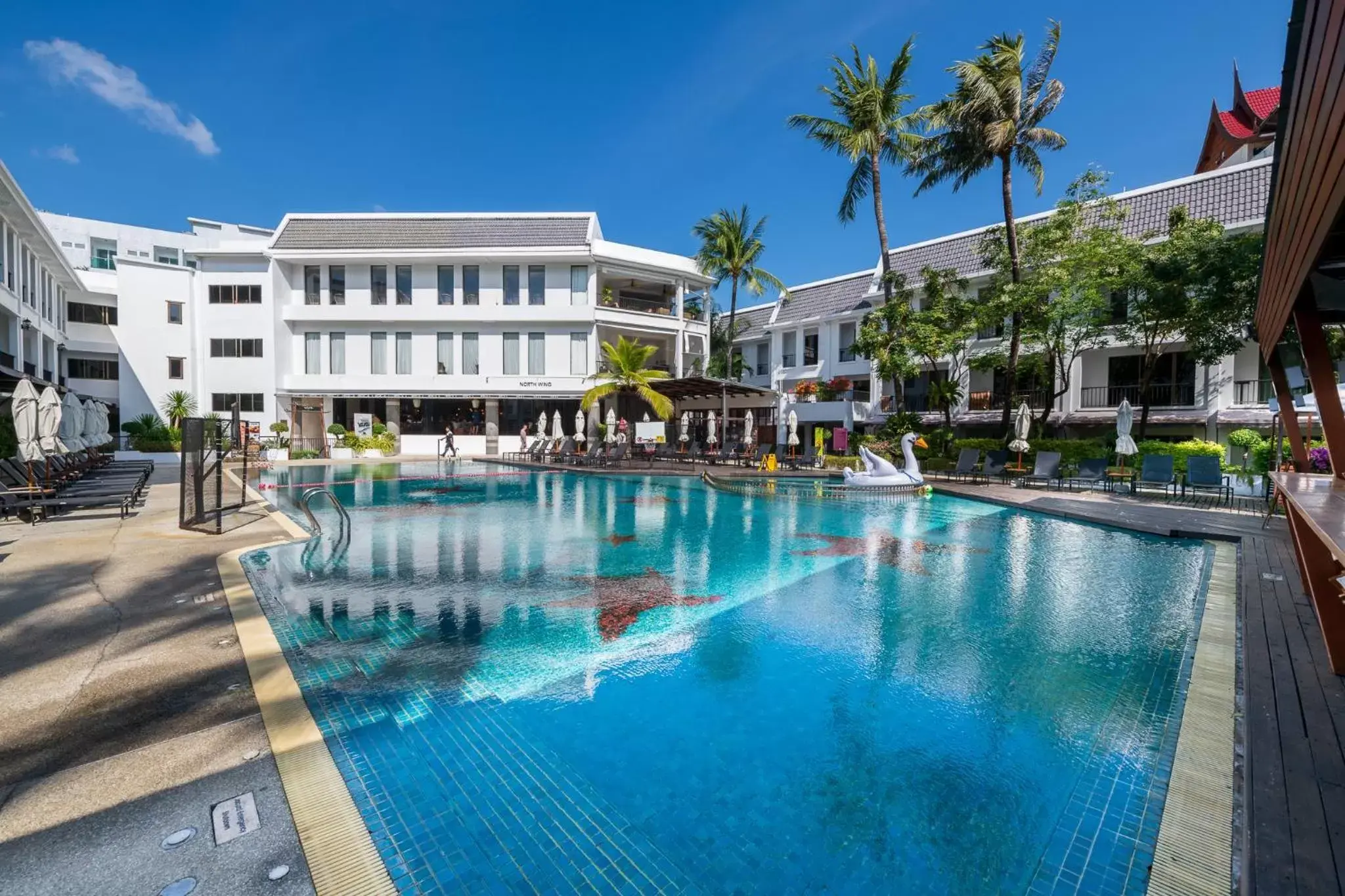 Swimming pool, Property Building in Sawaddi Patong Resort & Spa by Tolani - SHA Extra Plus