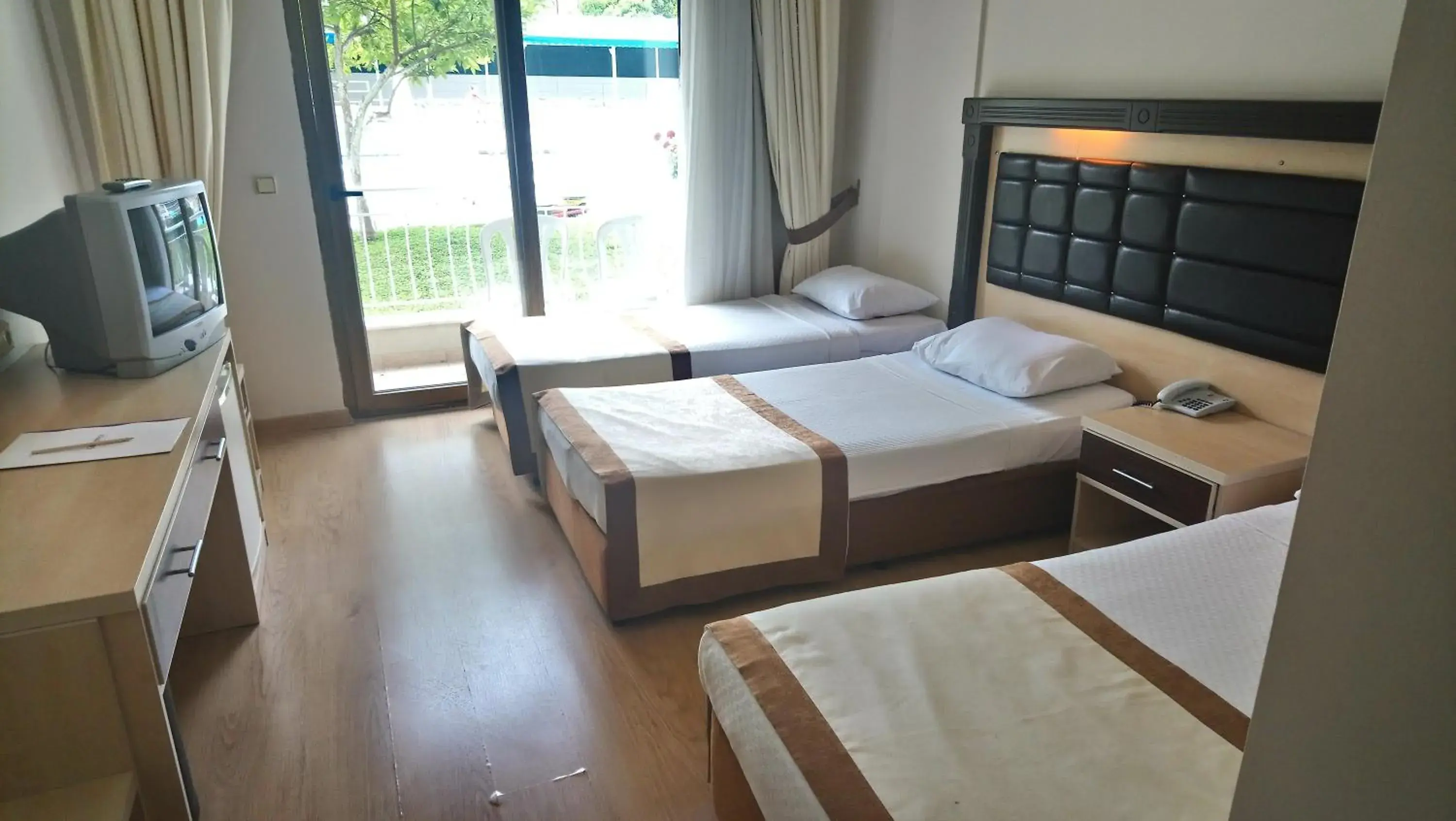 Property building, Bed in Tu Casa Gelidonya Hotel