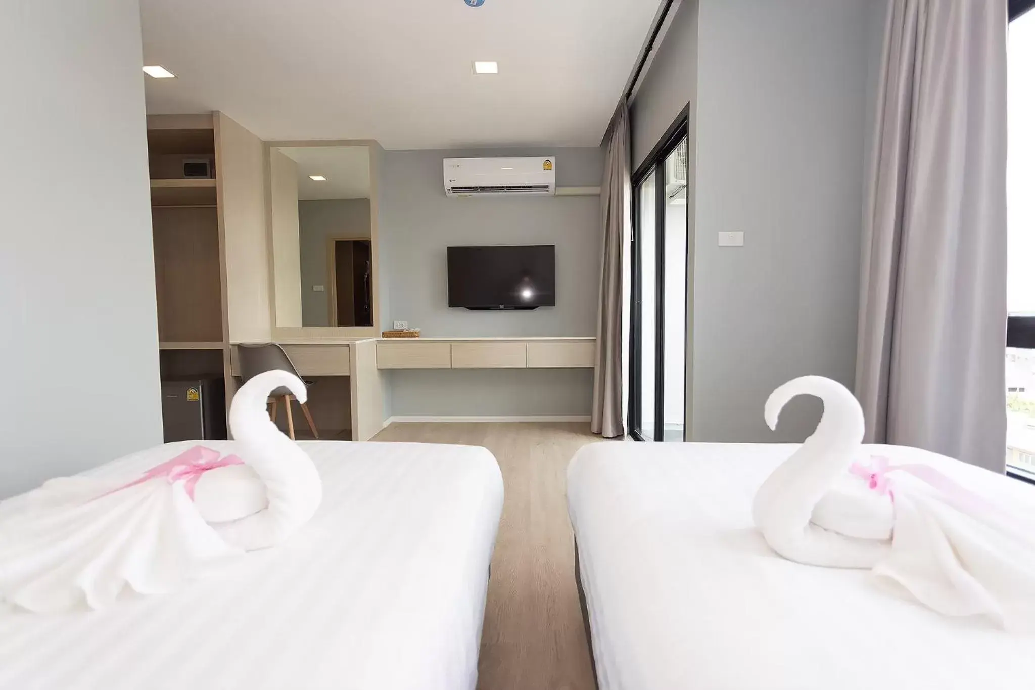 Photo of the whole room, Bed in Napa Hotel Ratchaburi