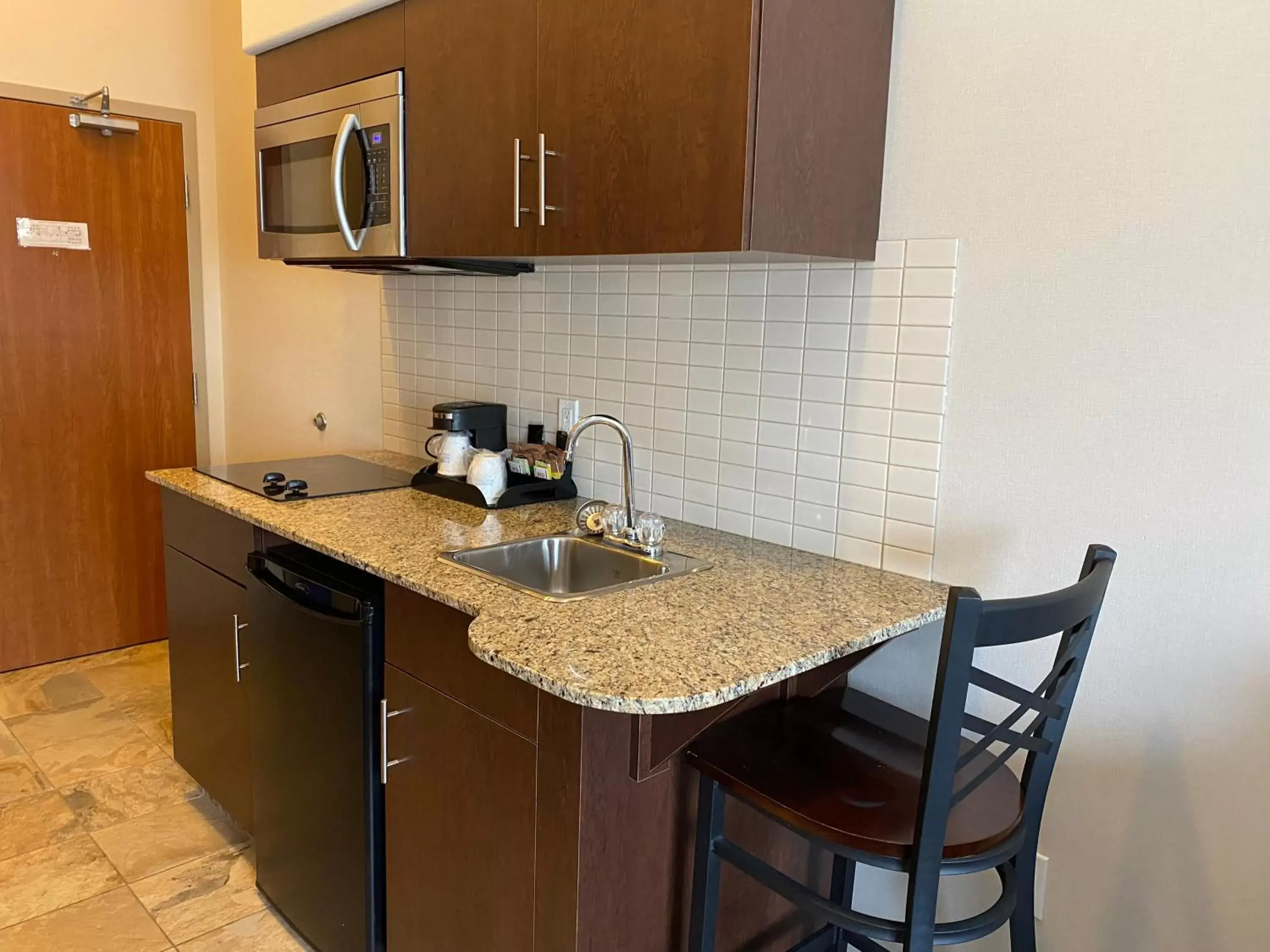 Kitchen/Kitchenette in Ramada by Wyndham Creston