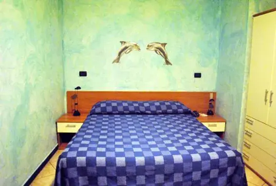 Bed in Hotel Acquario